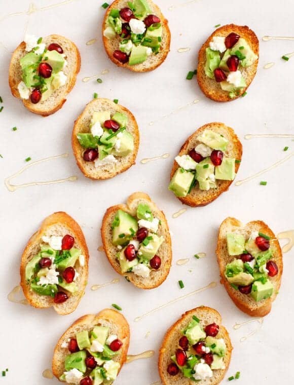 avocado pomegranate crostini / @loveandlemons