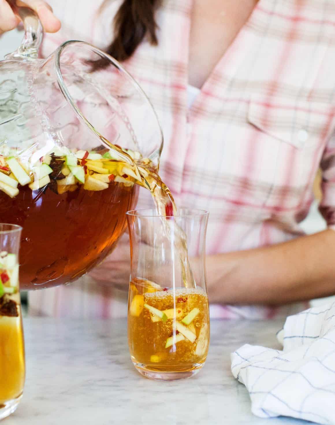 sweet tea sparkling apple cider poured into a glass