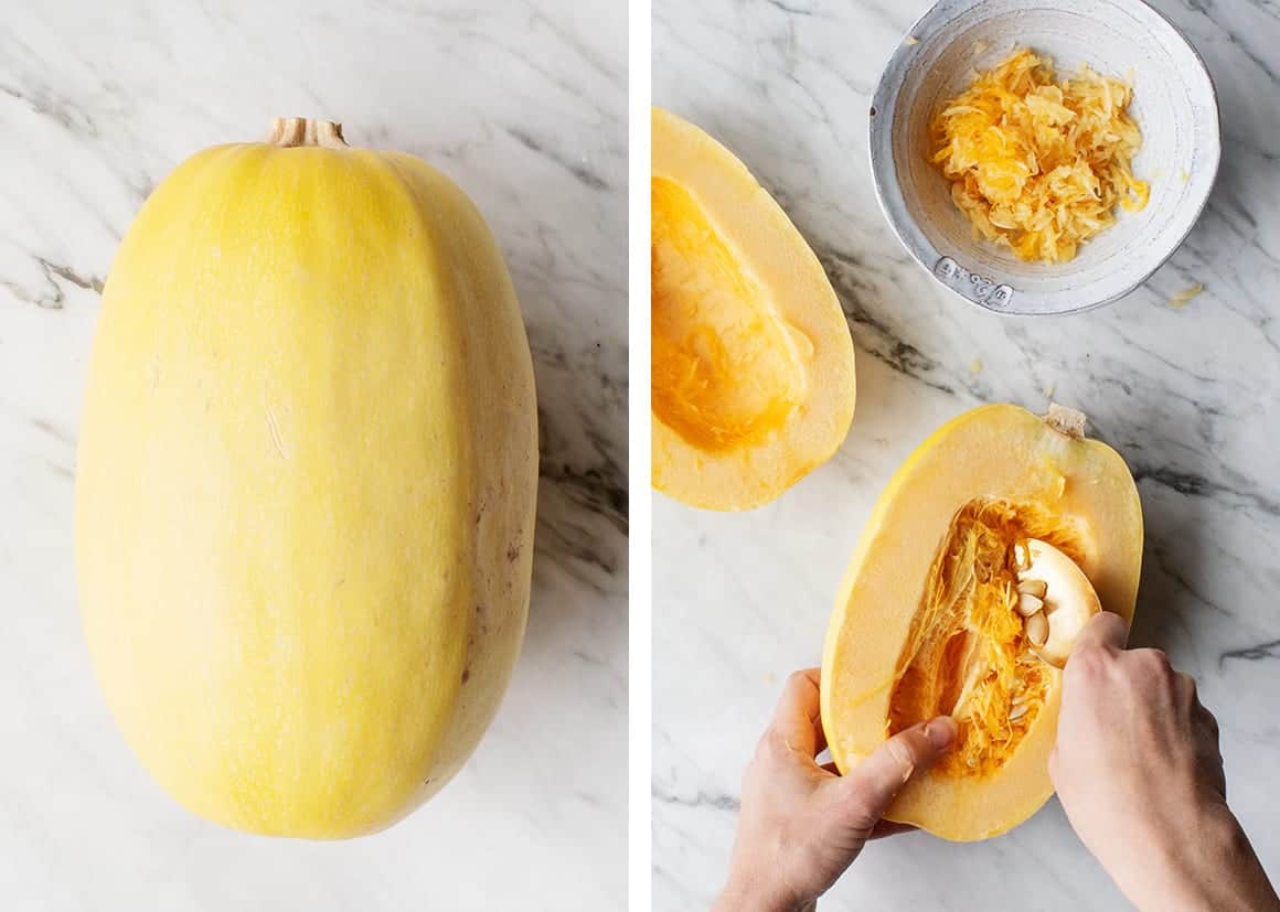 Hands scooping seeds from halved Spaghetti Squash