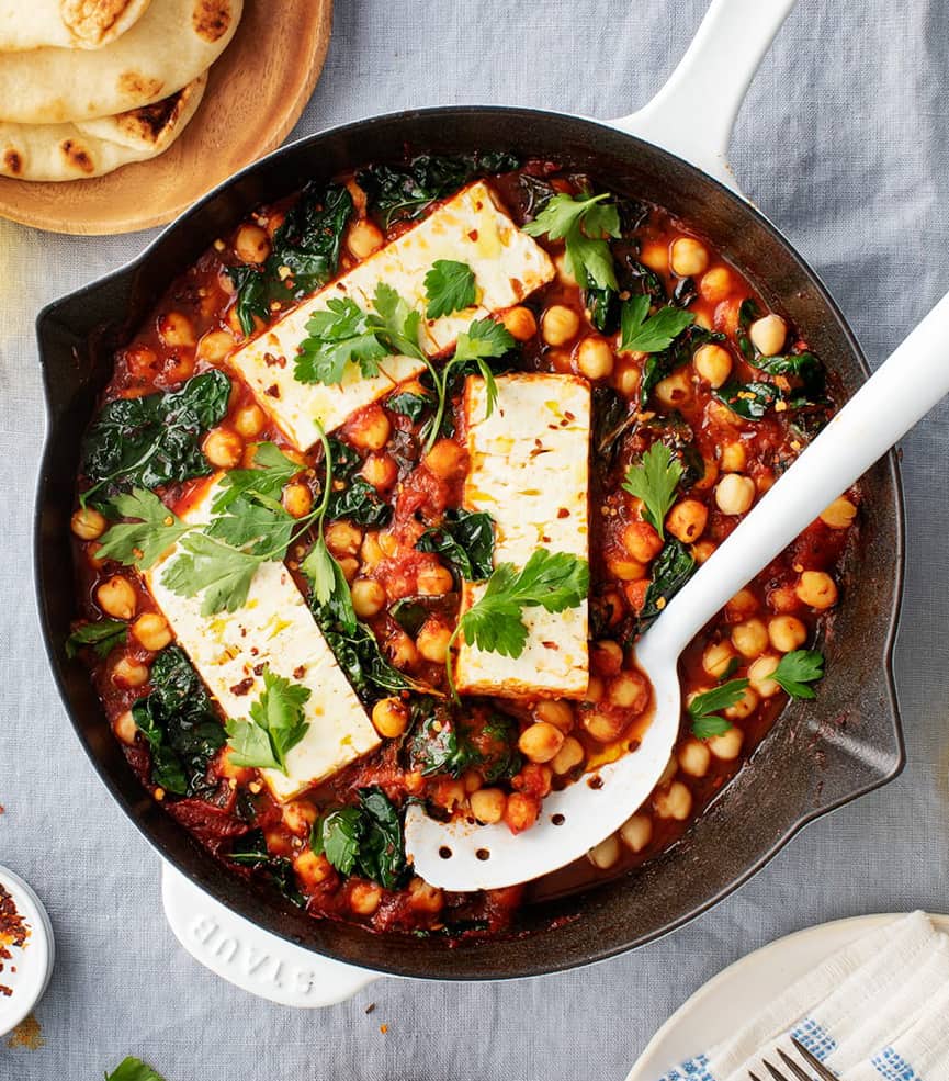 Baked Feta with tomato sauce, chickpeas, and kale