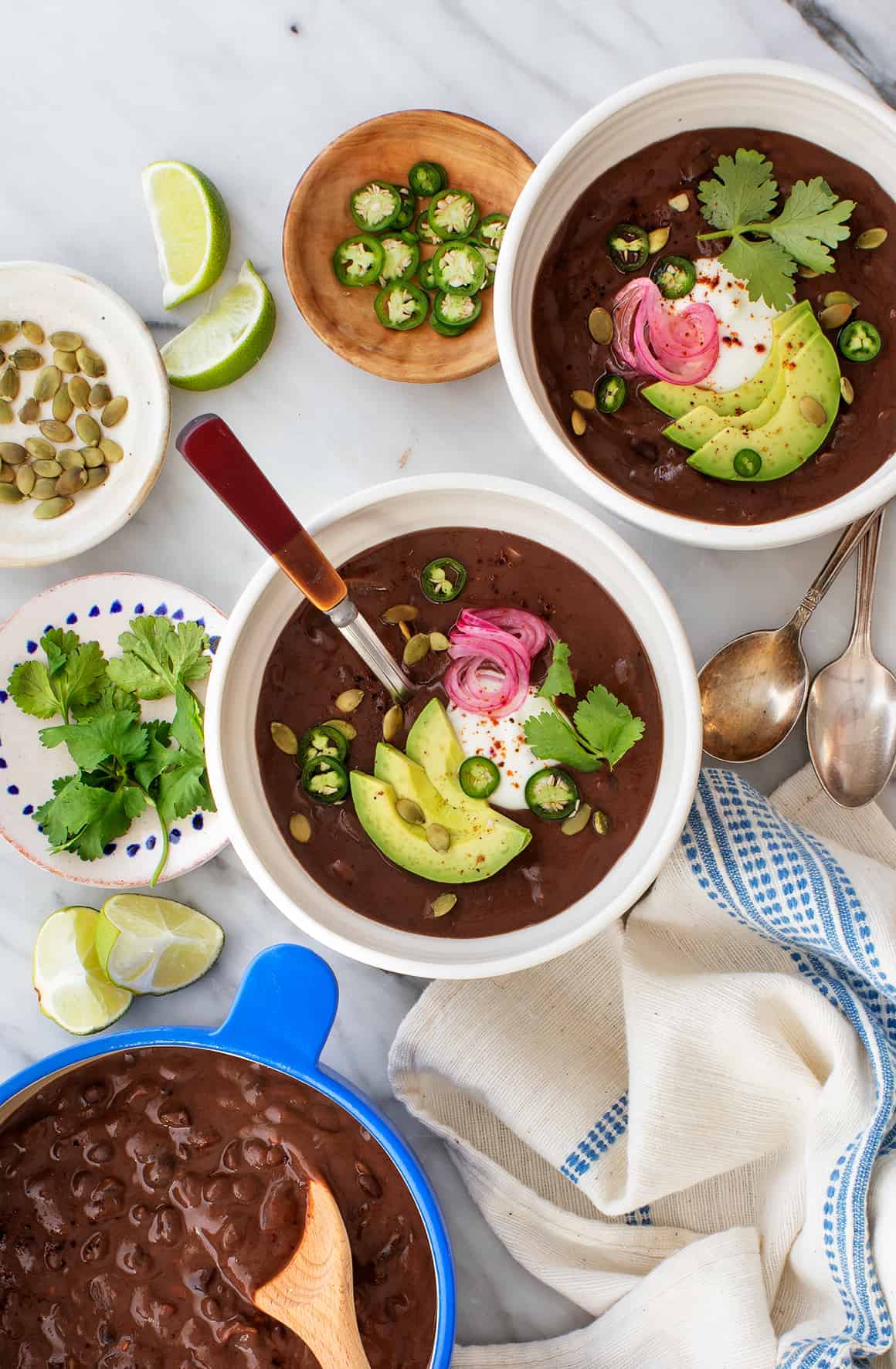 Two bowls of vegan meal prep black bean soup 