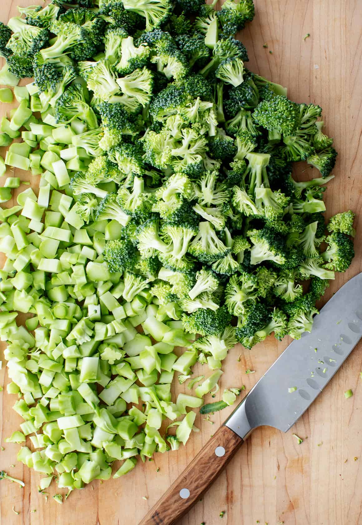 Chopped broccoli on a cutting board