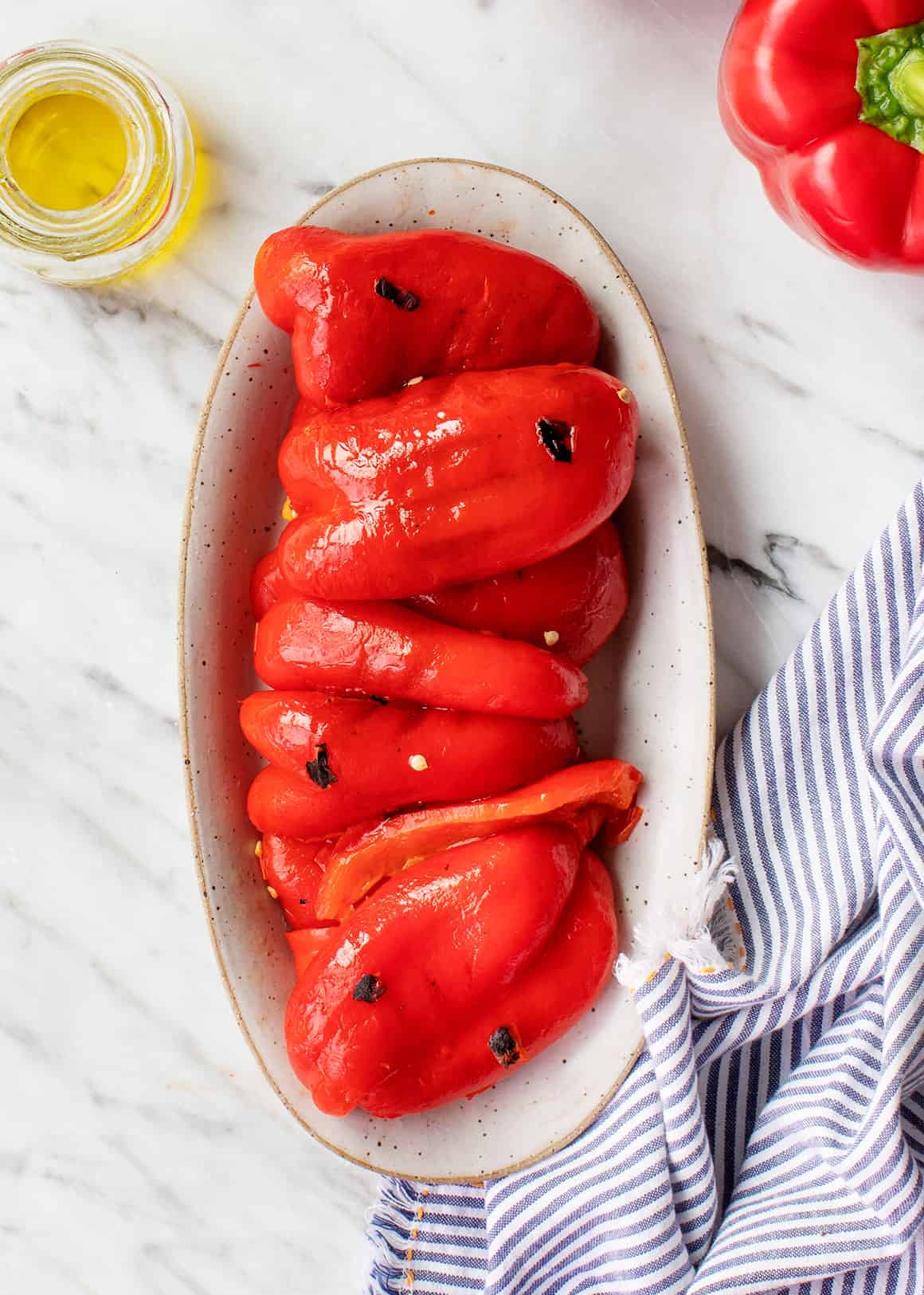 Roasted red peppers on a platter