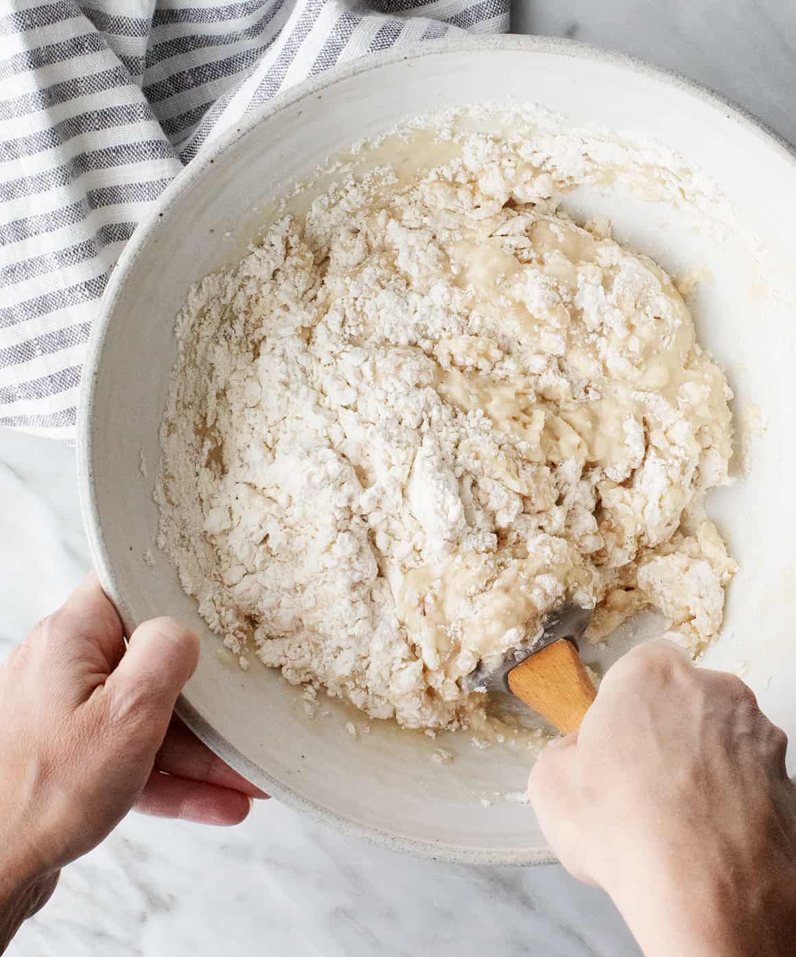 Mixing dough in a large bowl