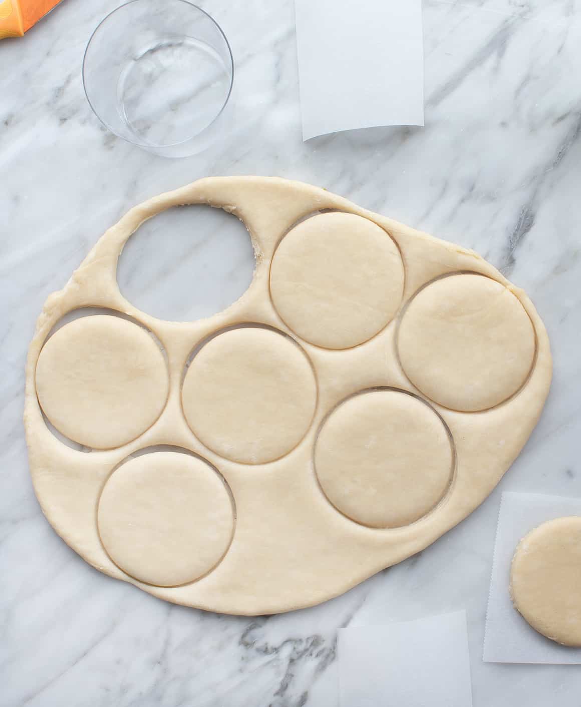 Cutting out dough with a glass