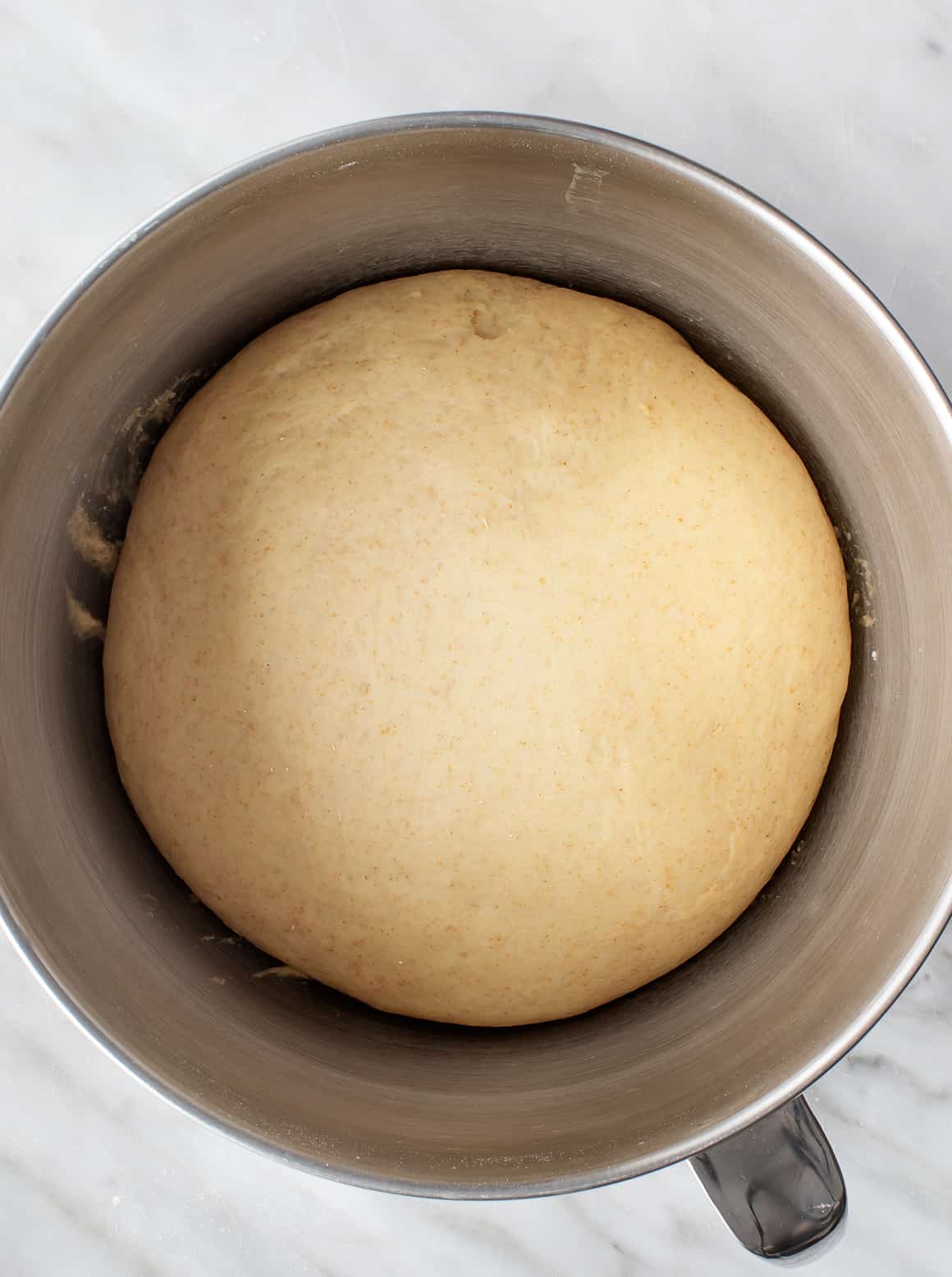 Homemade Hamburger Buns Dough rising in large bowl