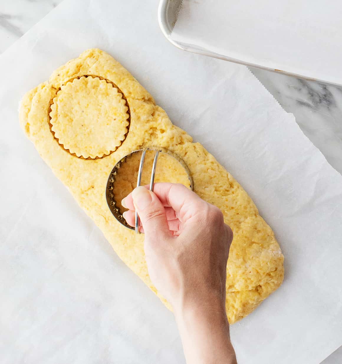 Cutting out biscuit dough