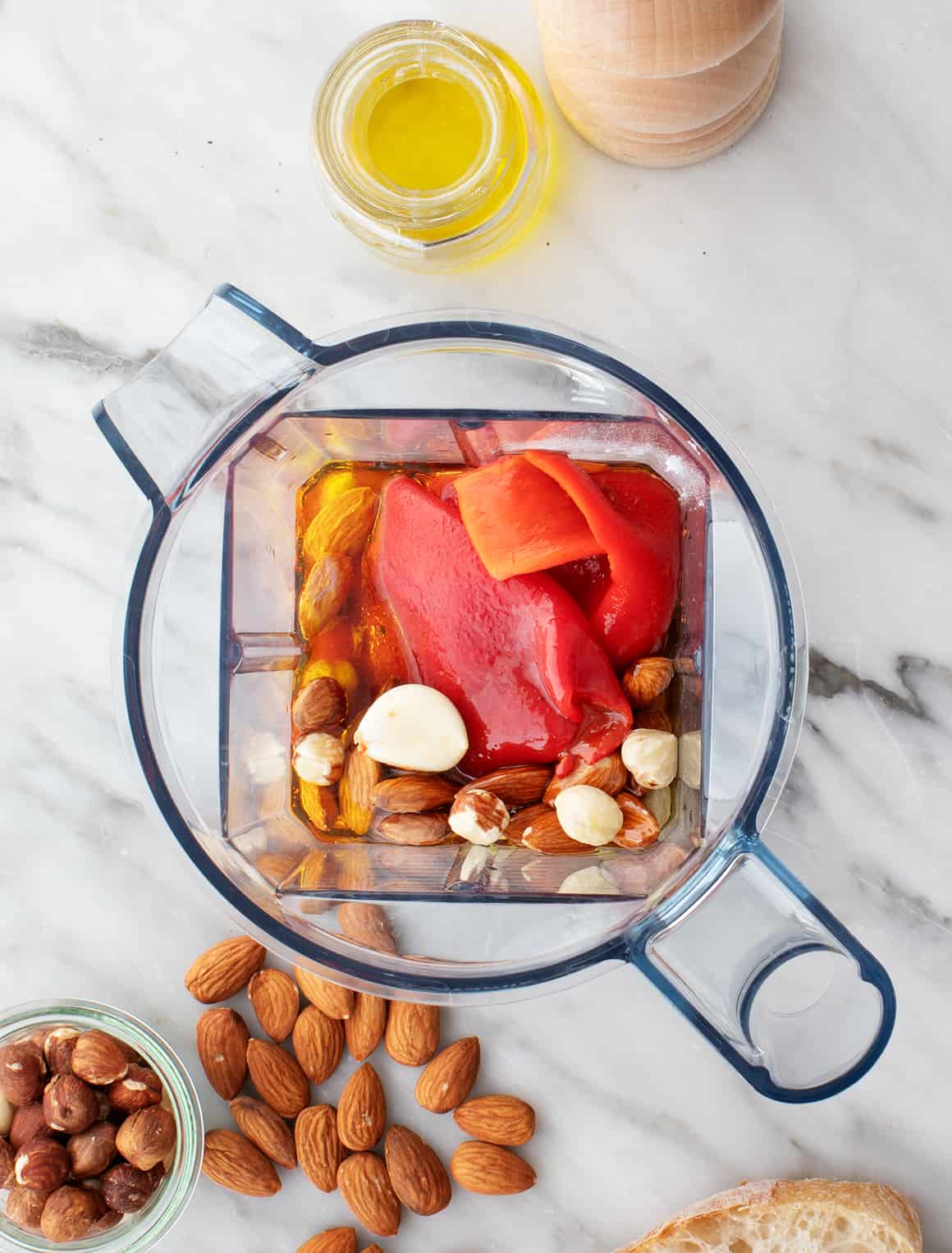 Garlic, nuts, roasted red peppers, and olive oil in a blender