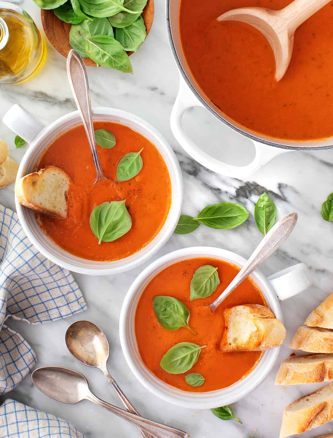 Two bowls of homemade tomato basil soup