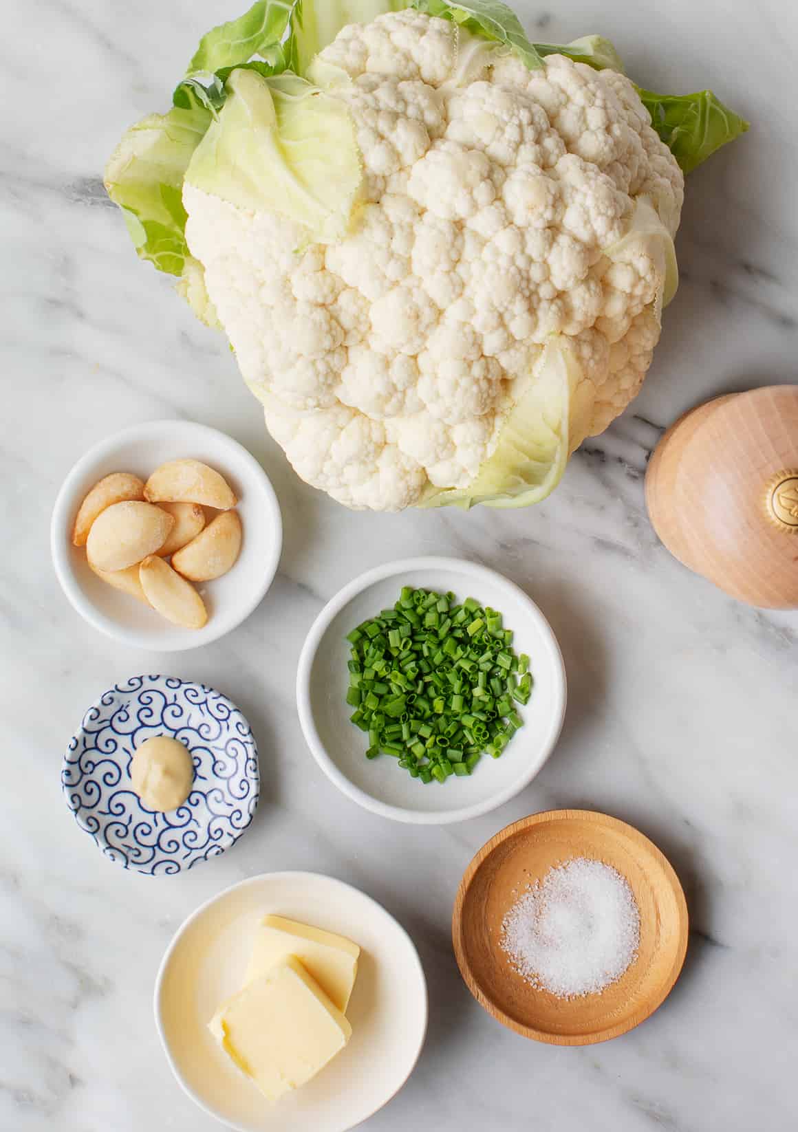 Cauliflower, roasted garlic, mustard, butter, salt, pepper, and chives