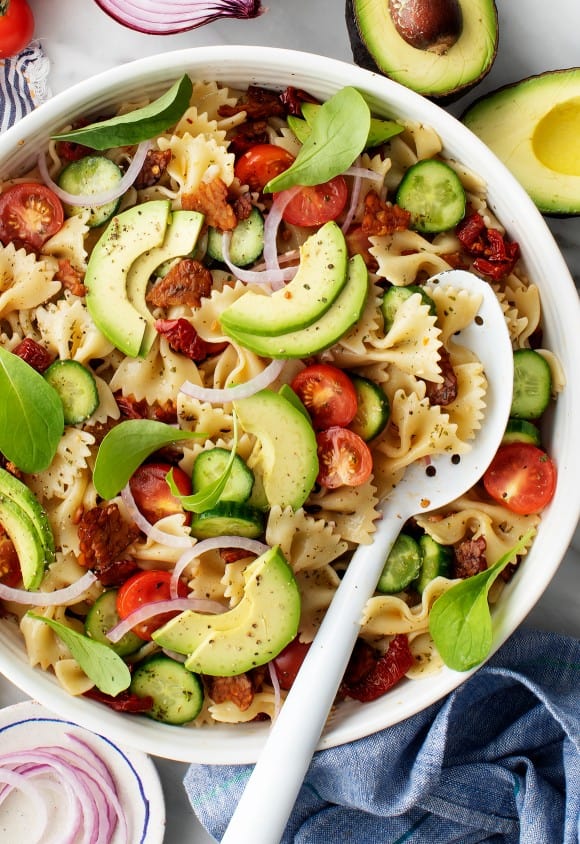 Vegan BLT Pasta Salad with serving spoon