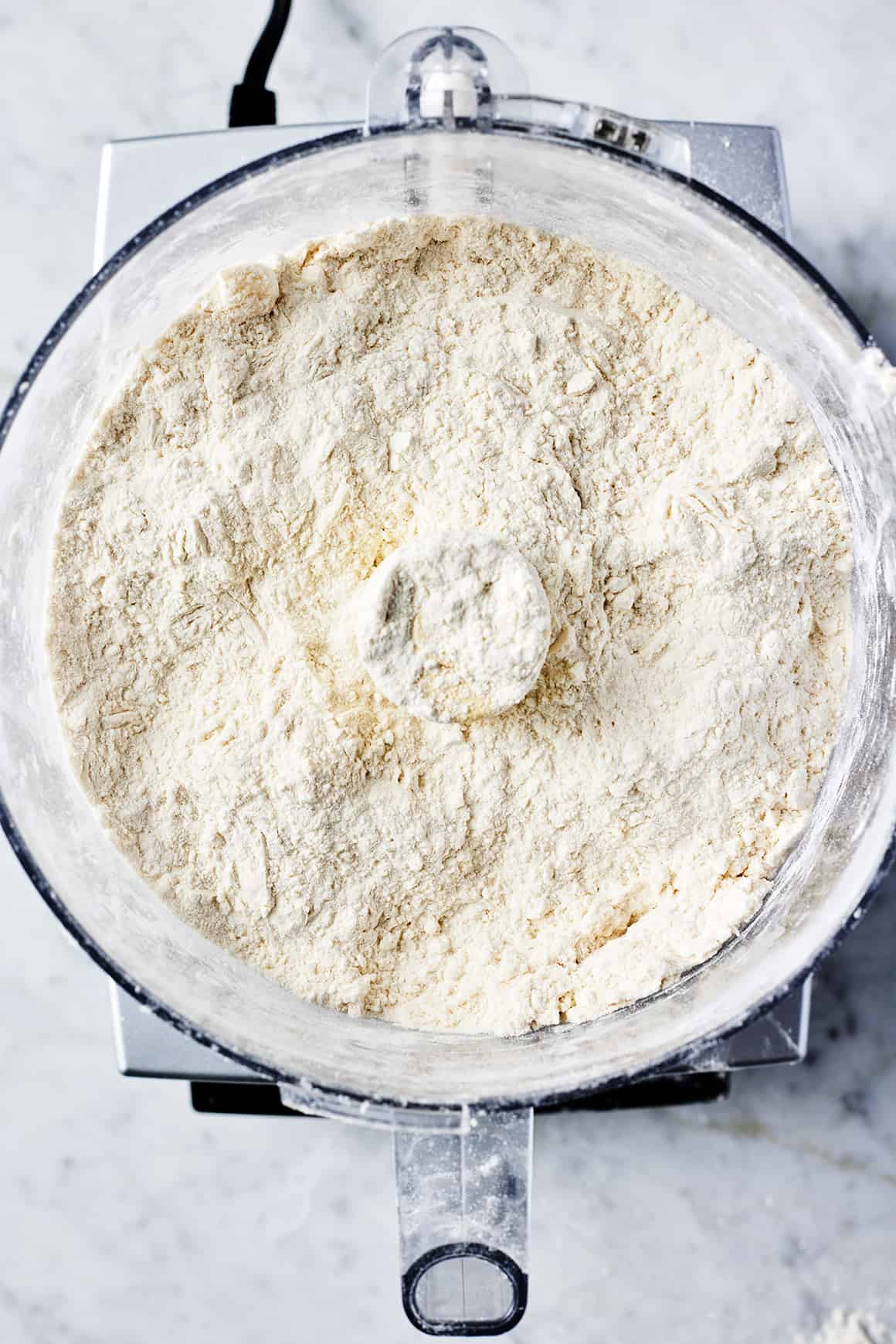 Flour covering butter/flour mixture in food processor