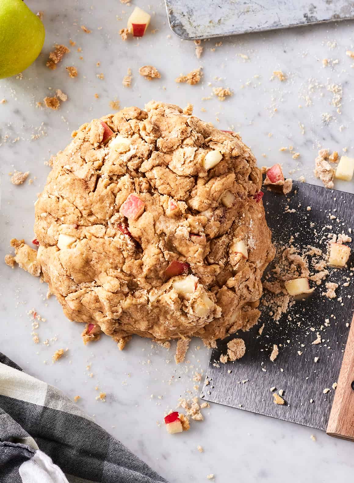 Ball of dough flecked with diced apple