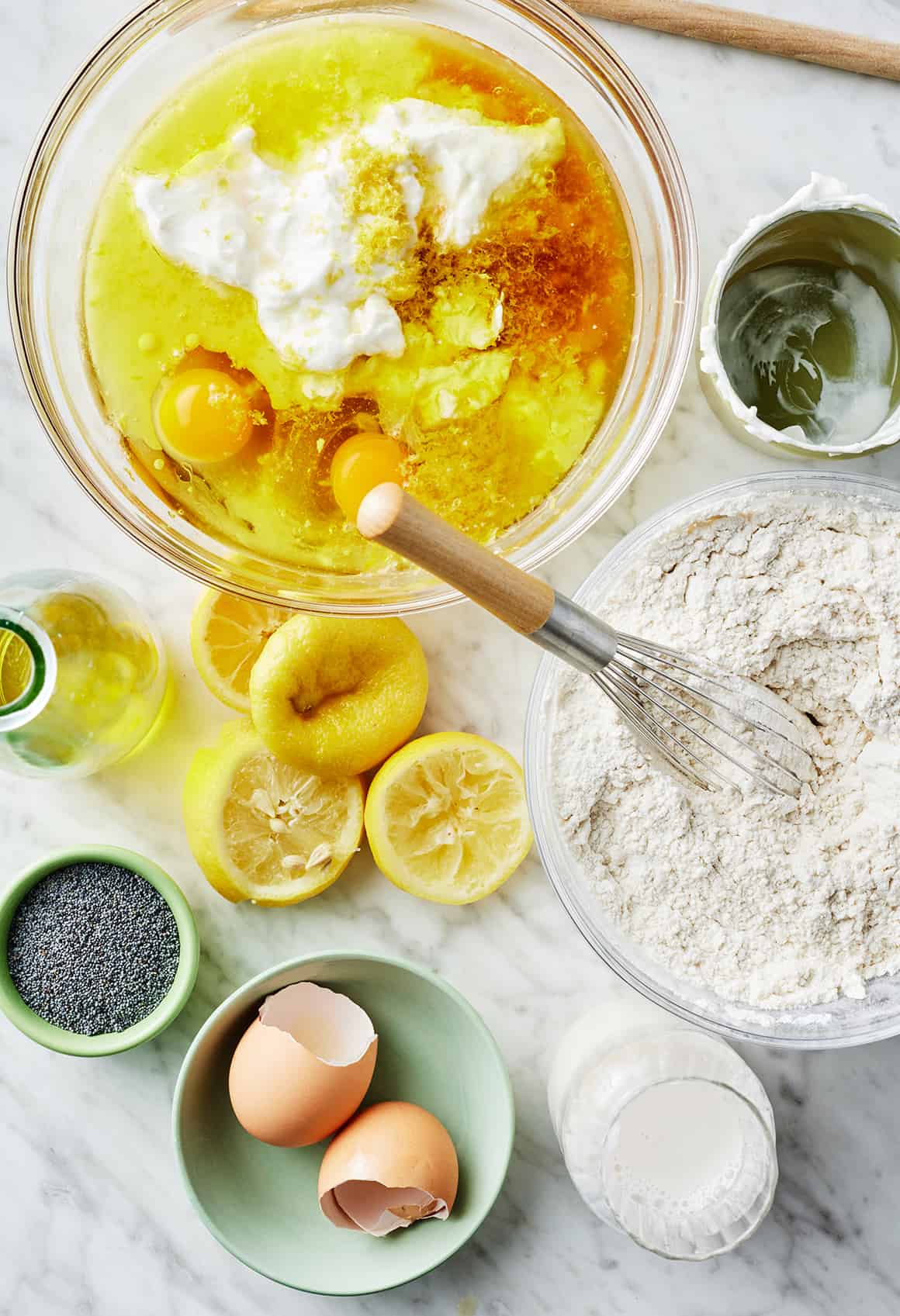 Bowl of wet ingredients next to bowl of dry ingredients