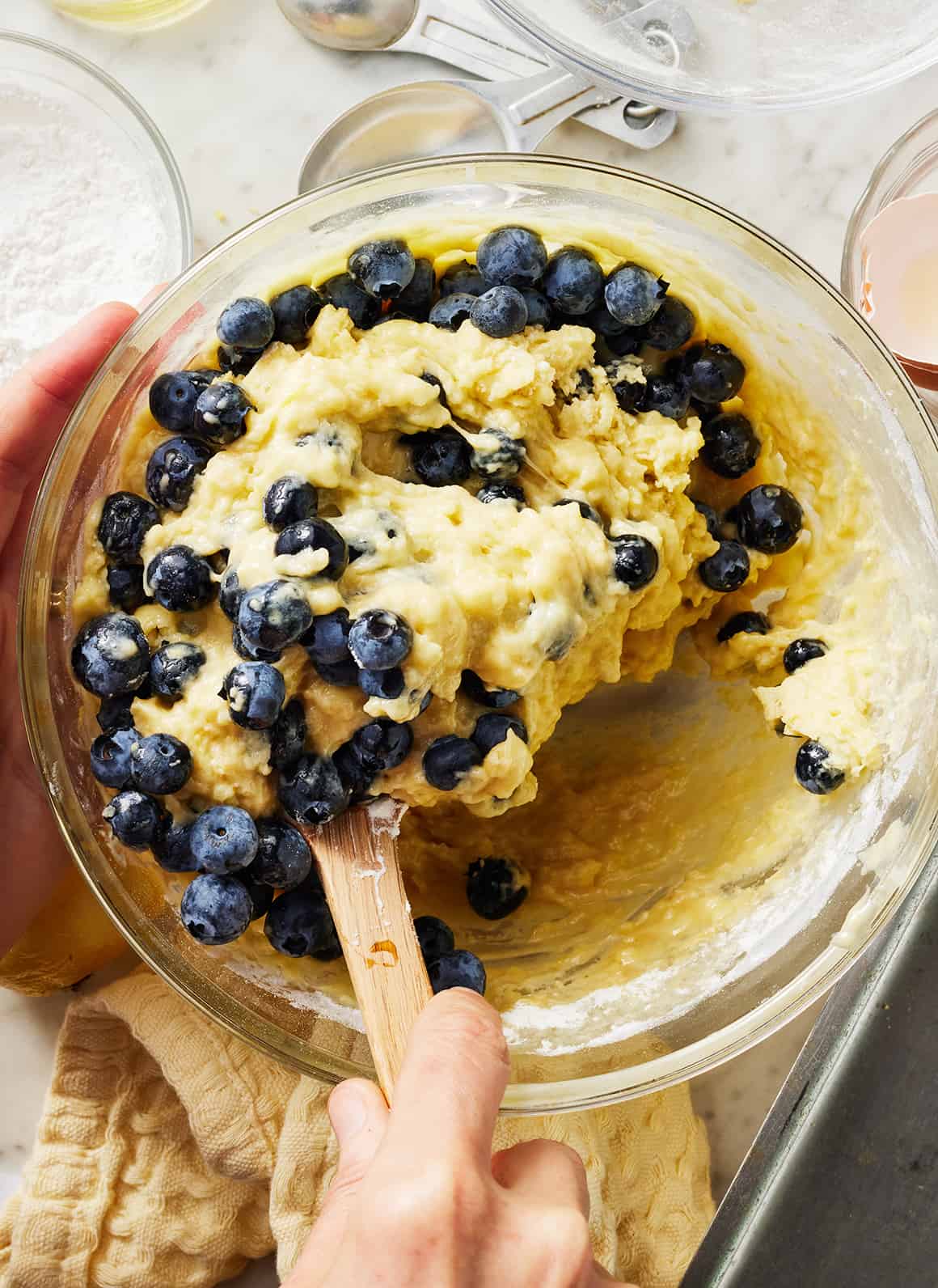 Lemon blueberry bread batter in mixing bowl