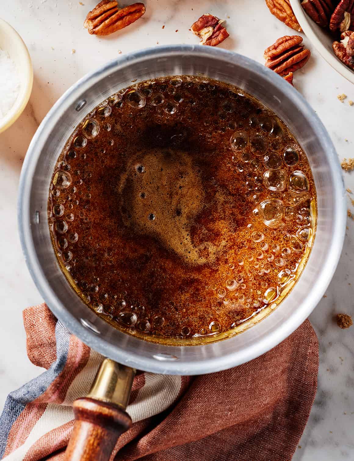 Brown sugar mixture bubbling in saucepan