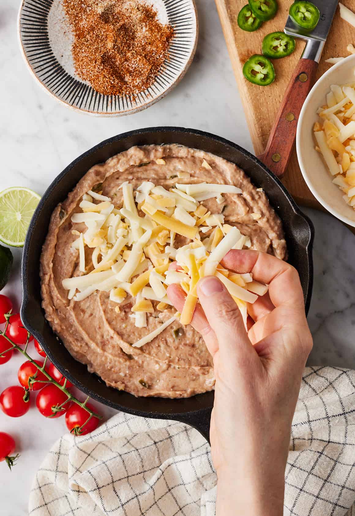 Topping bean dip with cheese