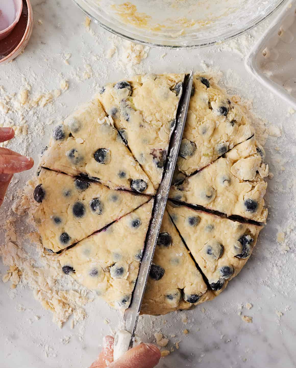 Slicing blueberry scones