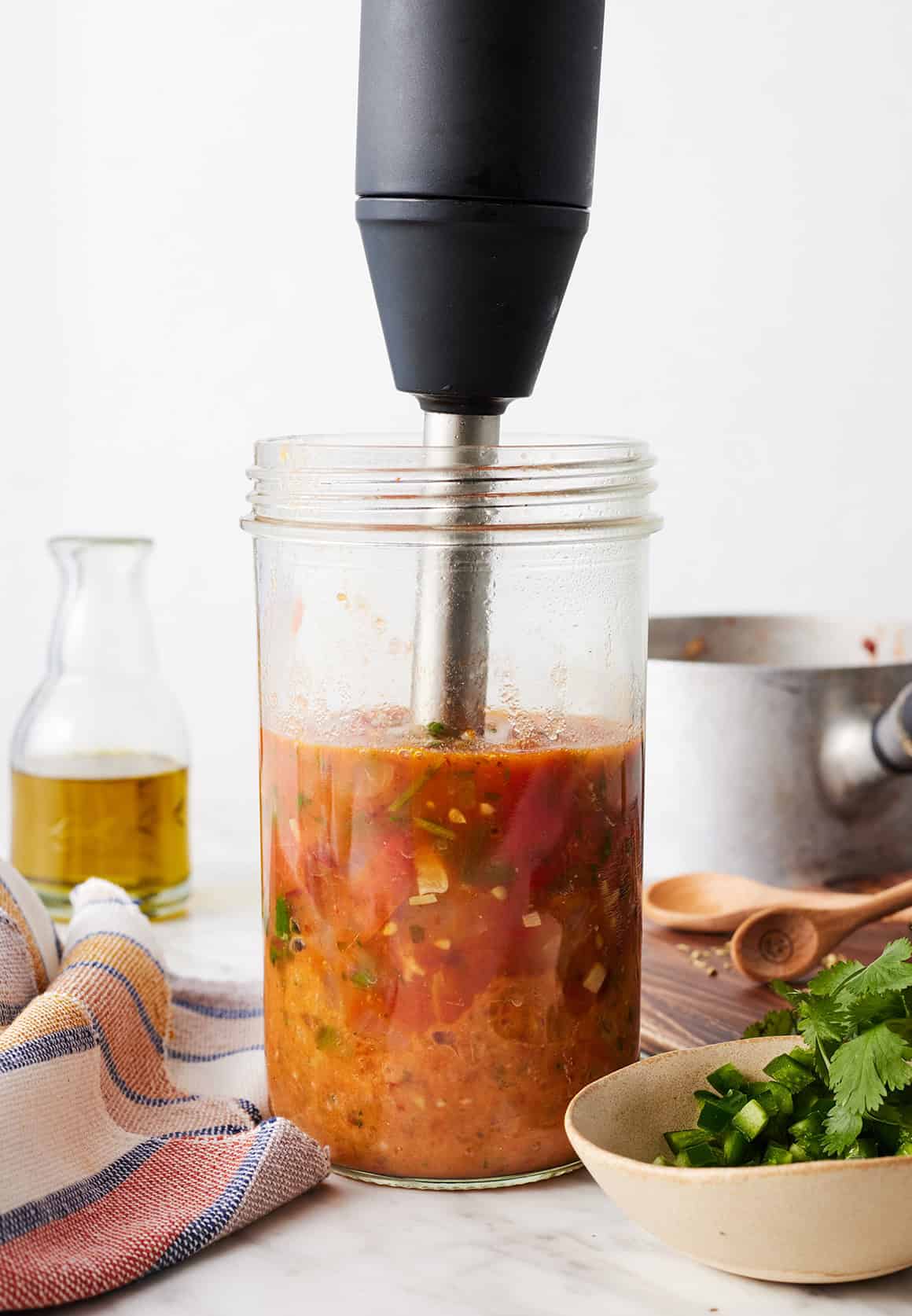 Blending homemade ranchero sauce in jar
