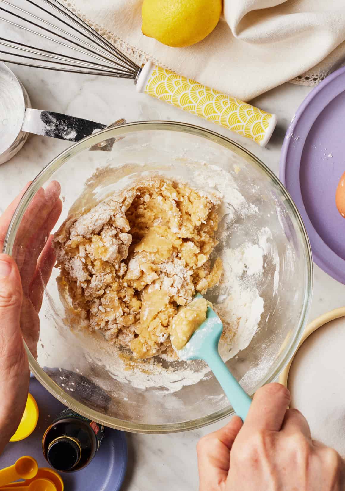 Mixing crust ingredients in glass bowl