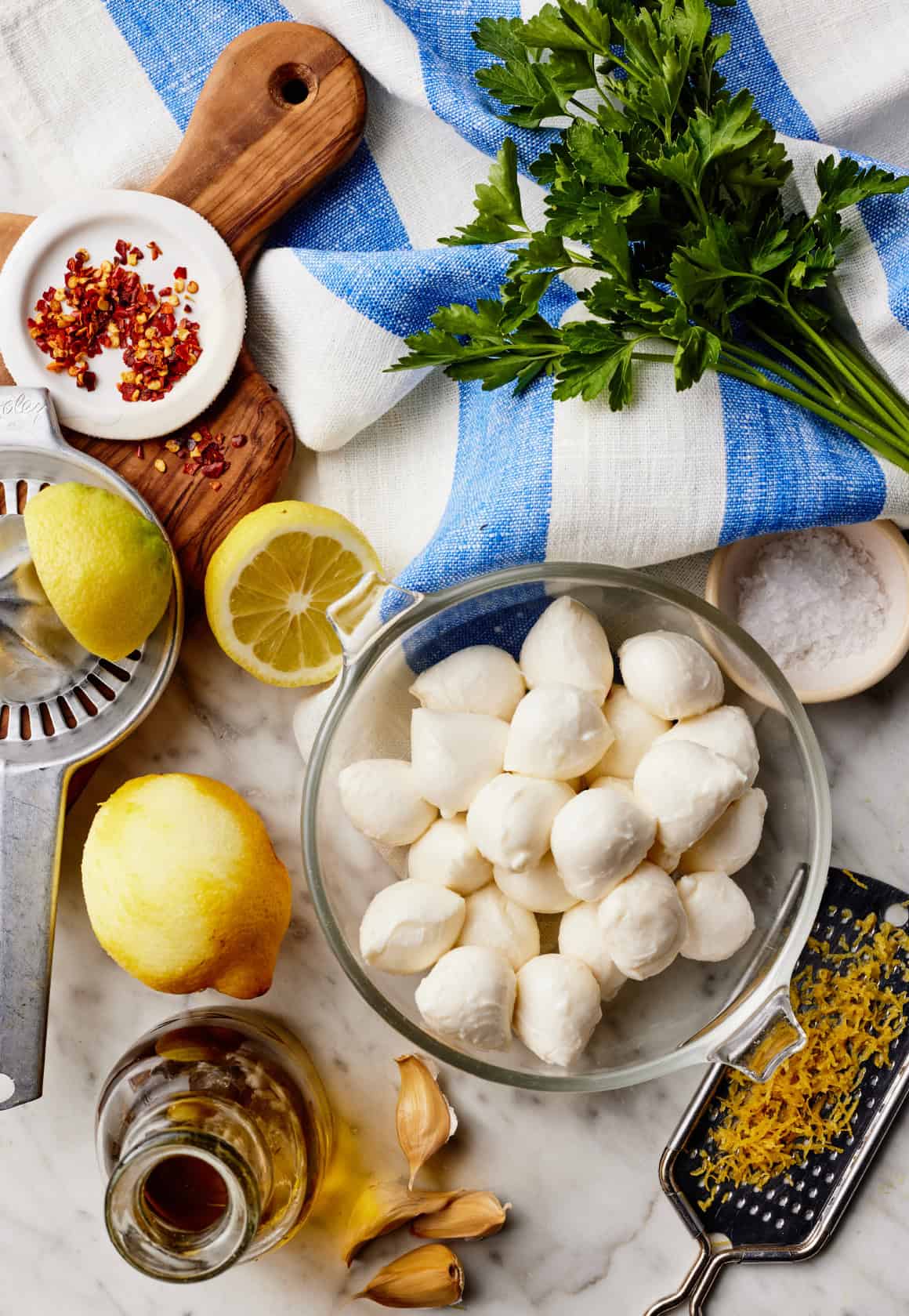 Ciliegine mozzarella balls, lemon, parsley, garlic, olive oil, and red pepper flakes