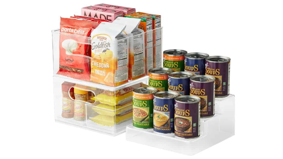 Clear pantry organizer filled with snacks and non-perishables.