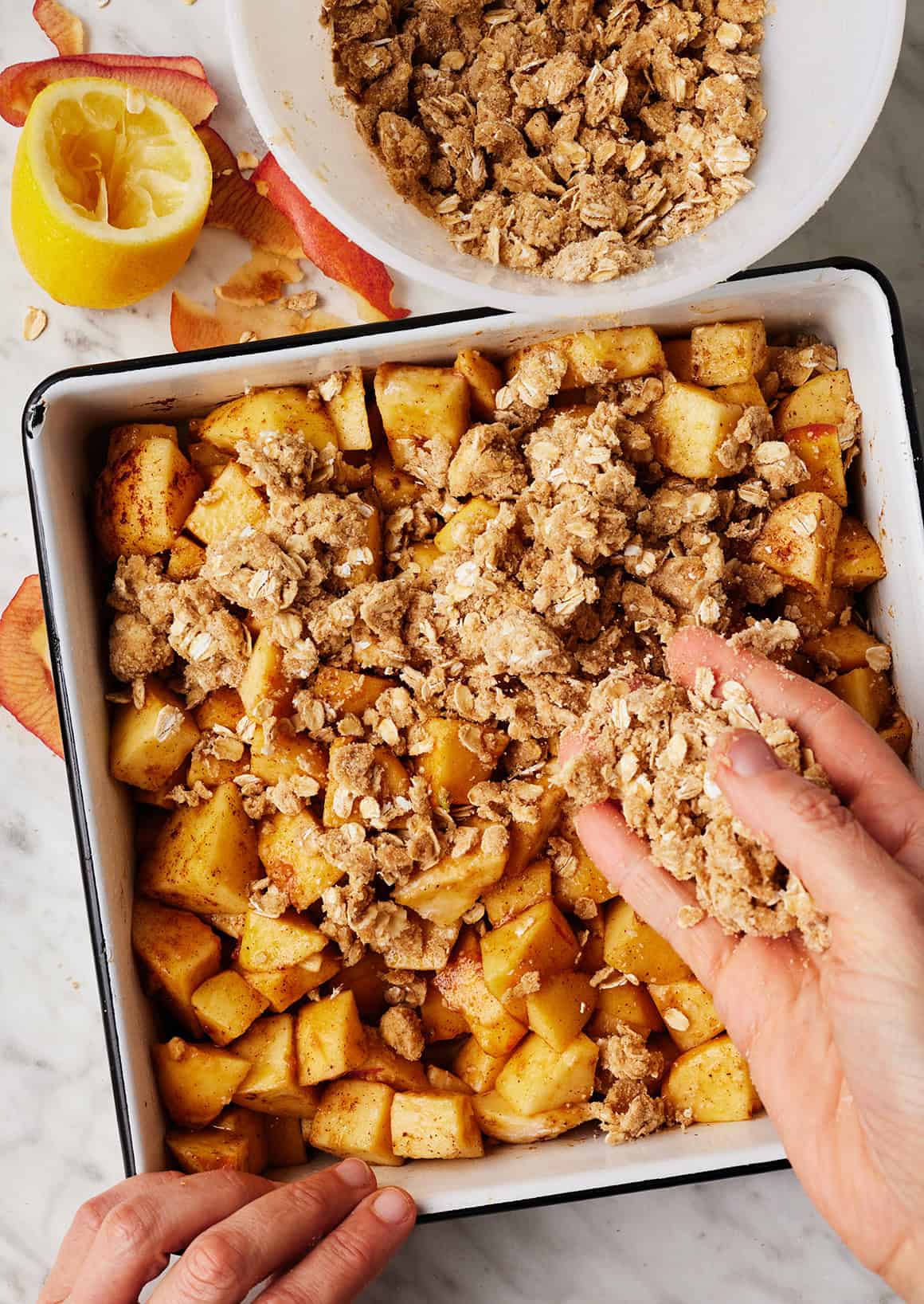 Sprinkle the streusel topping over the apples.