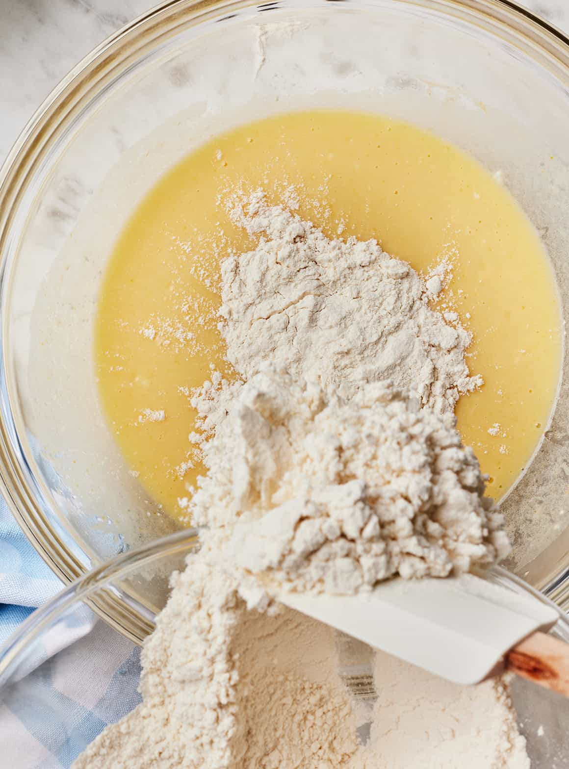Adding dry ingredients to wet ingredients
