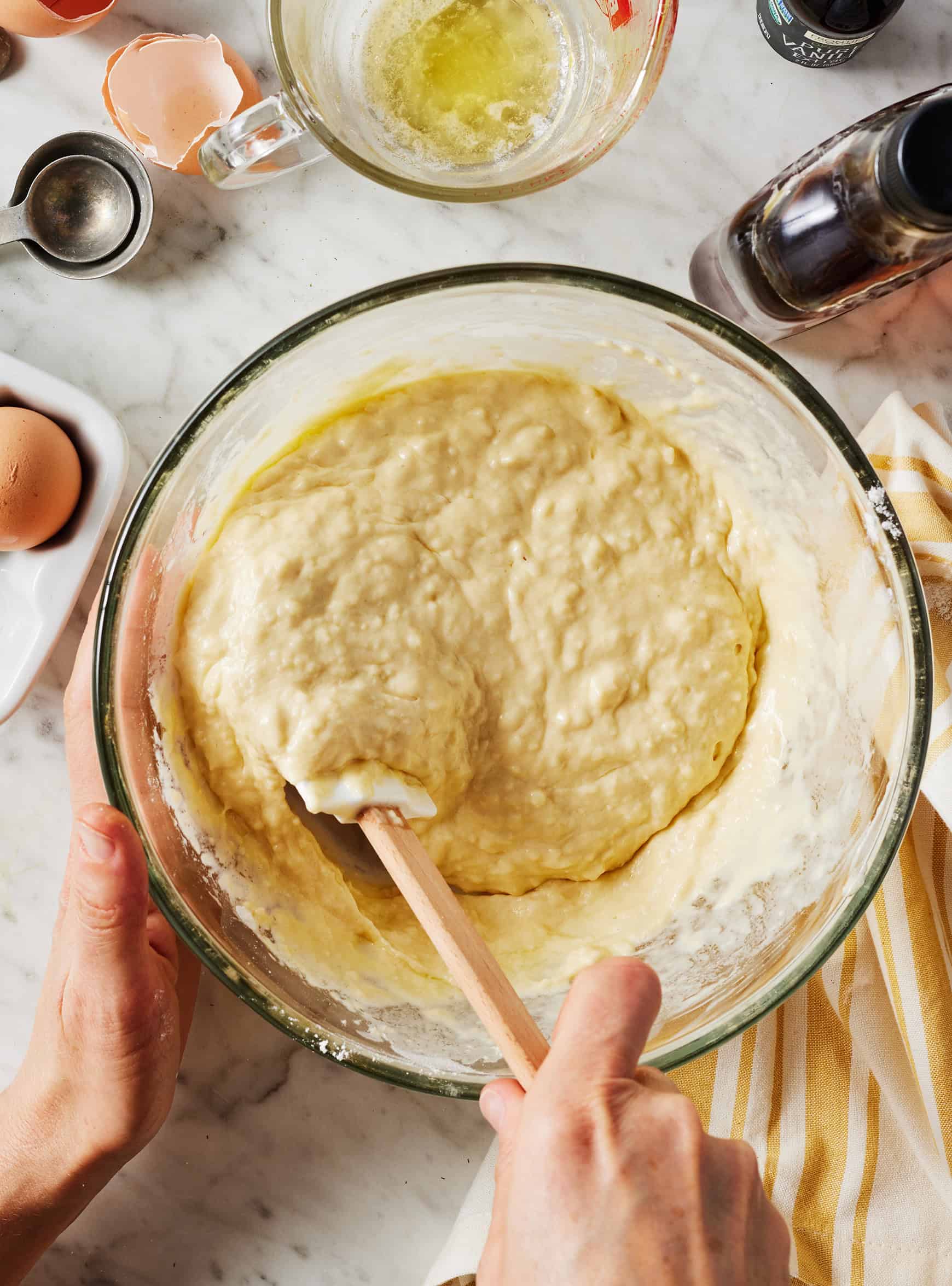 Mixing waffle batter in glass bowl