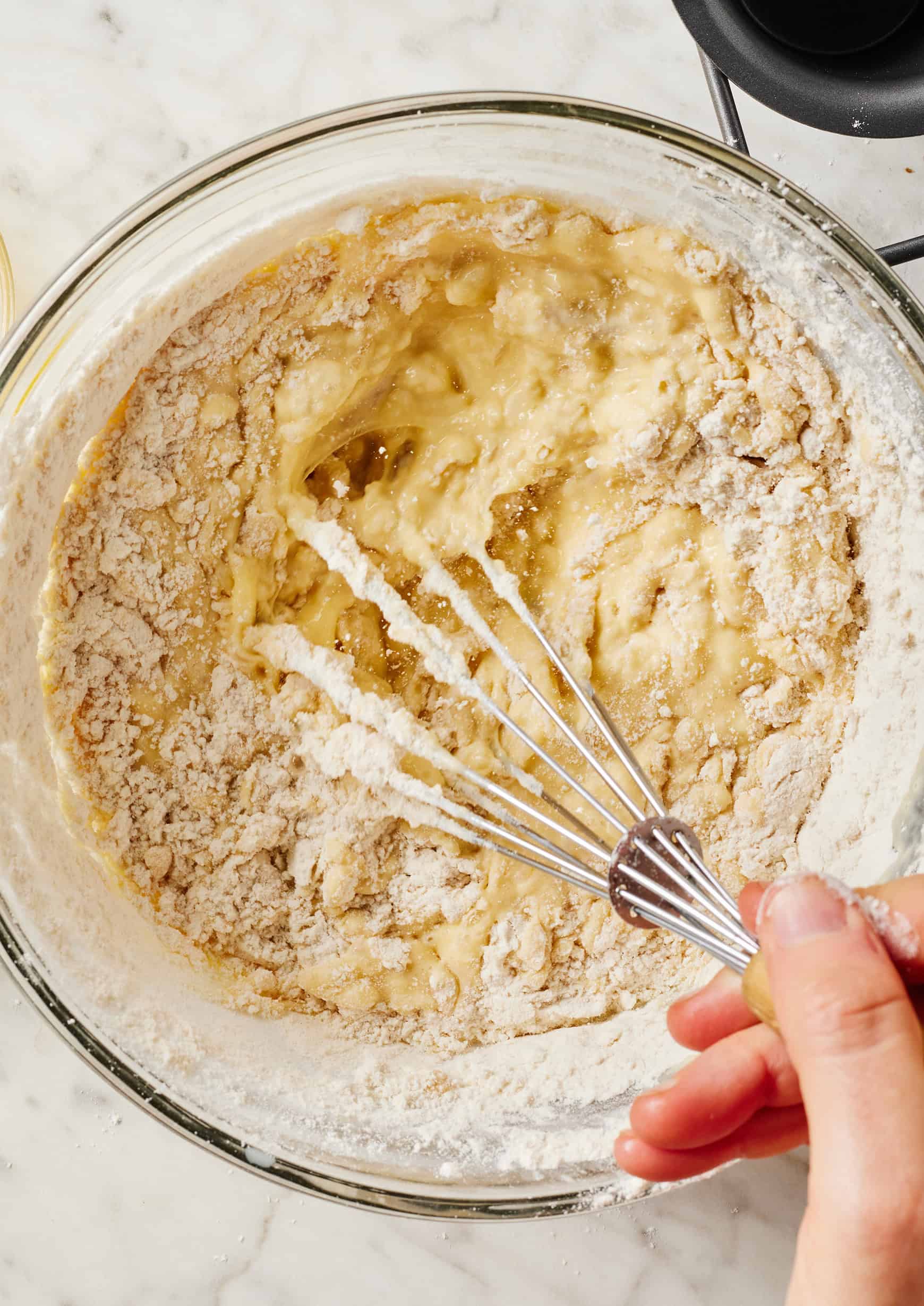 Whisking flour into wet ingredients