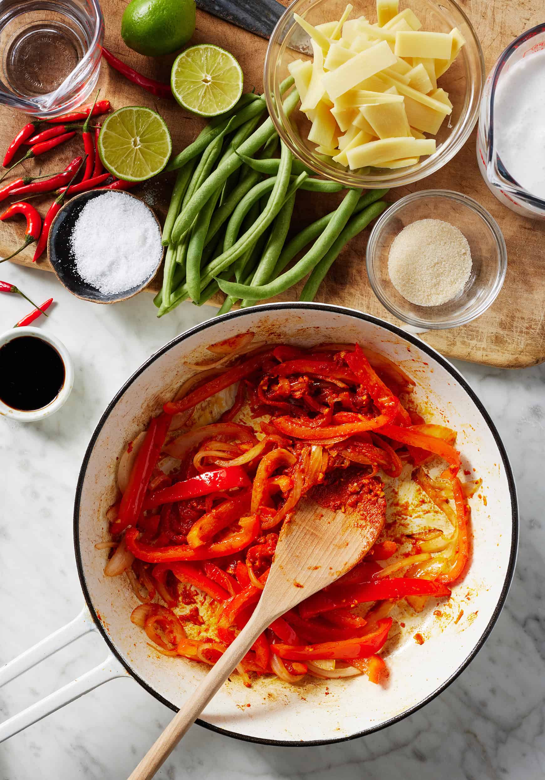 Sautéing peppers with red curry paste