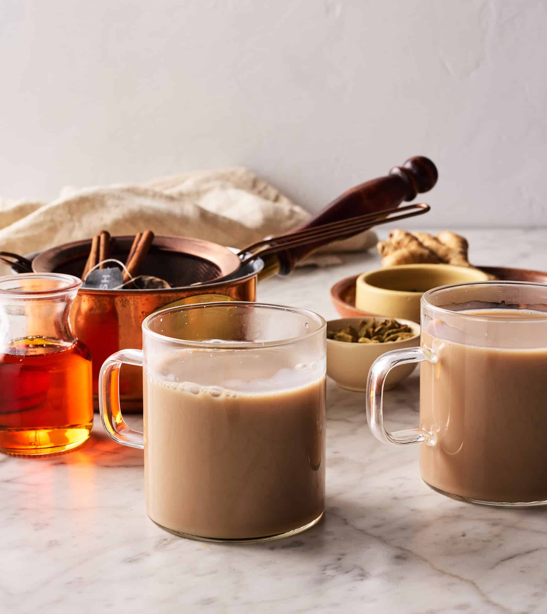 Chai tea lattes in glass mugs