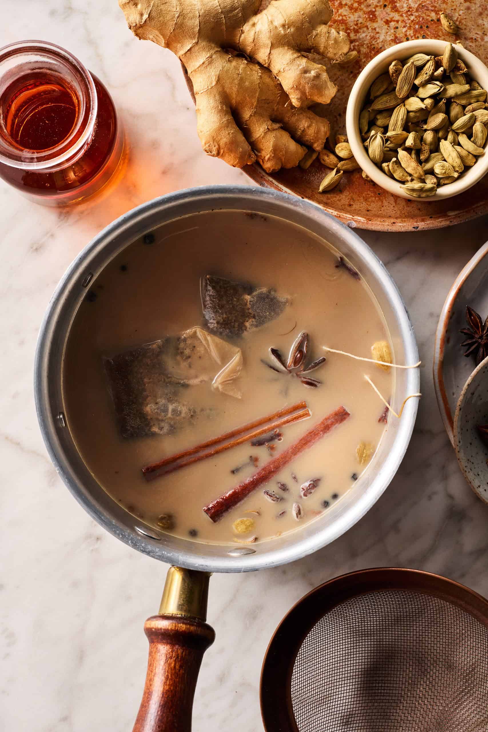 Steeping tea and spices in milk