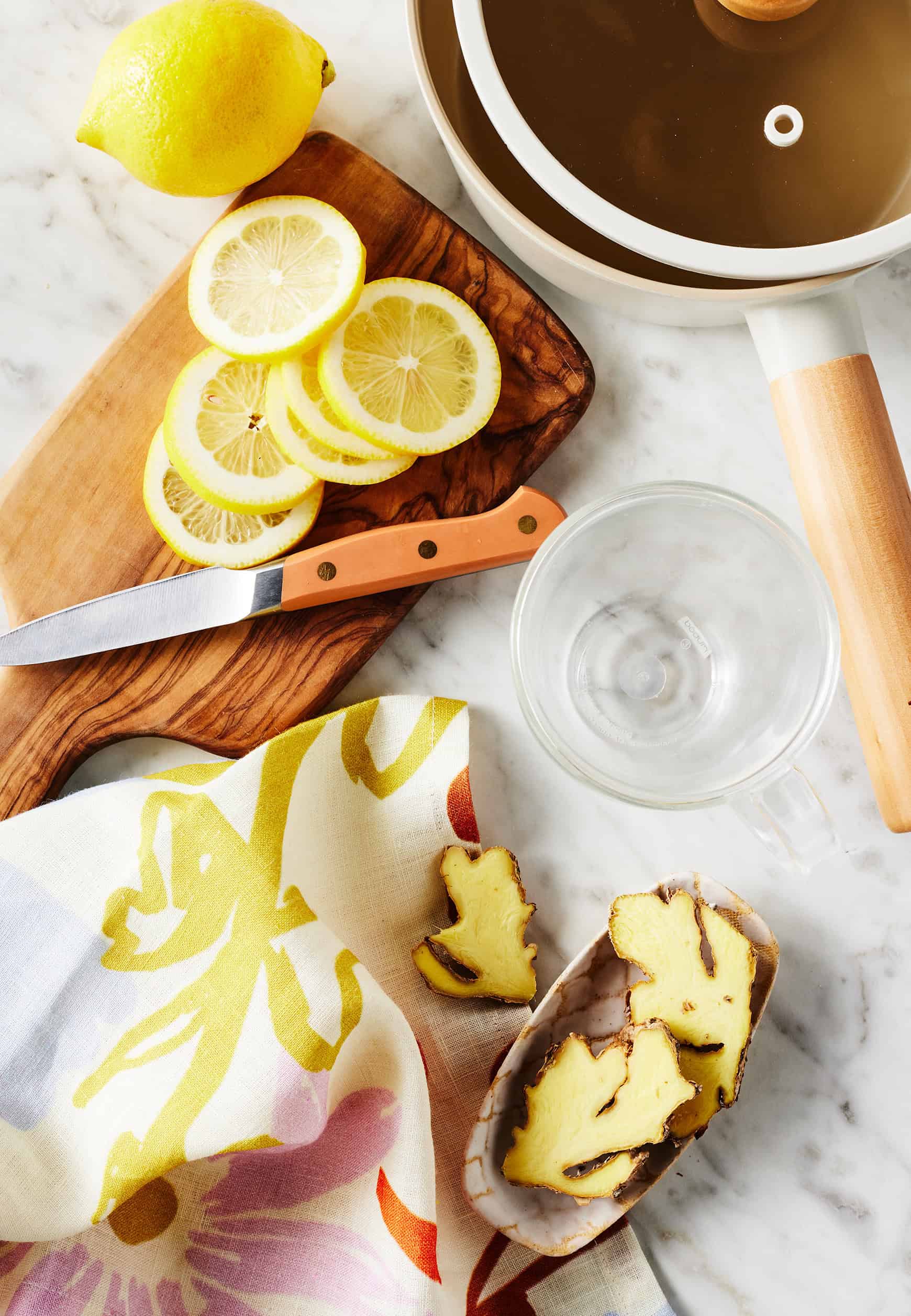 Recipe ingredients - fresh ginger root and lemon slices