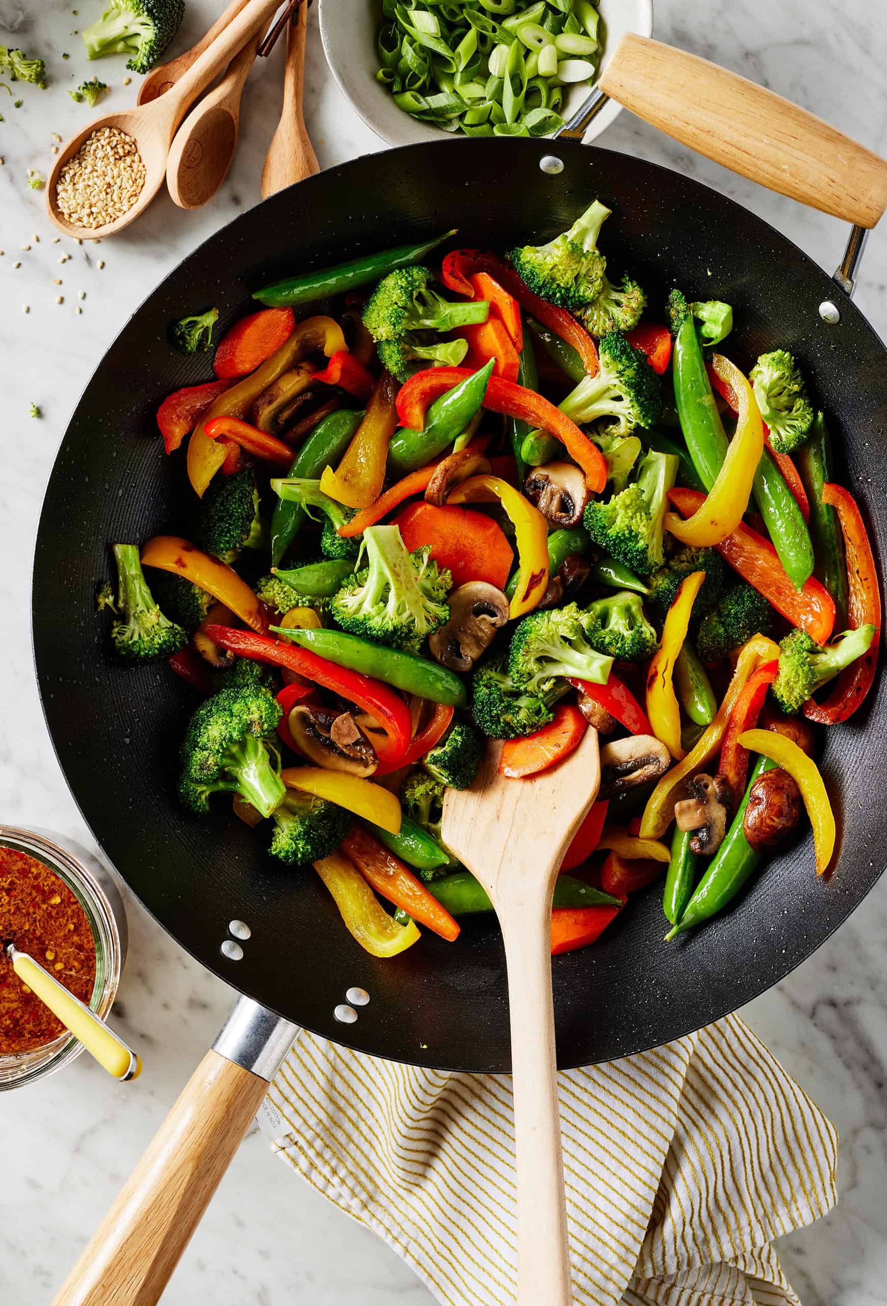 Cooking vegetables in wok