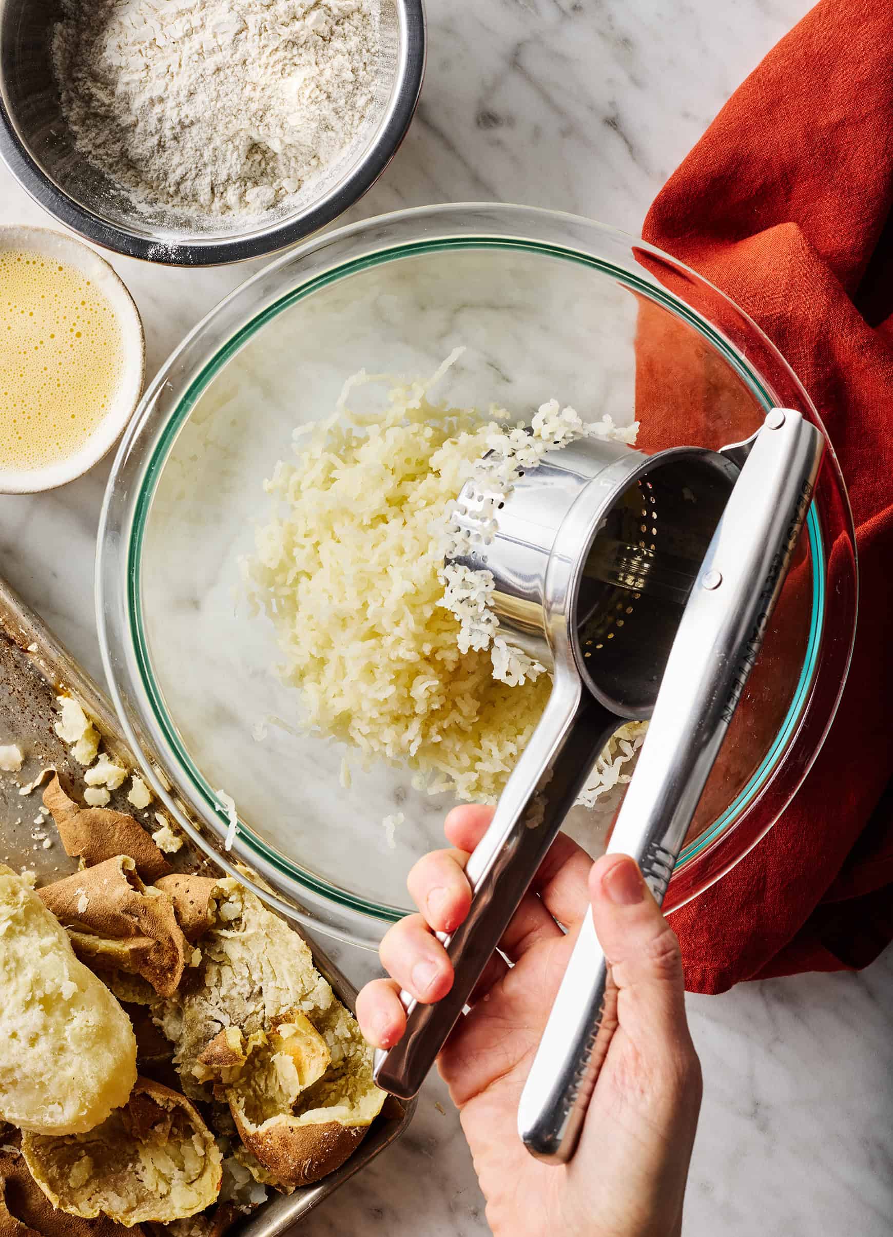 Passing potatoes through a potato ricer