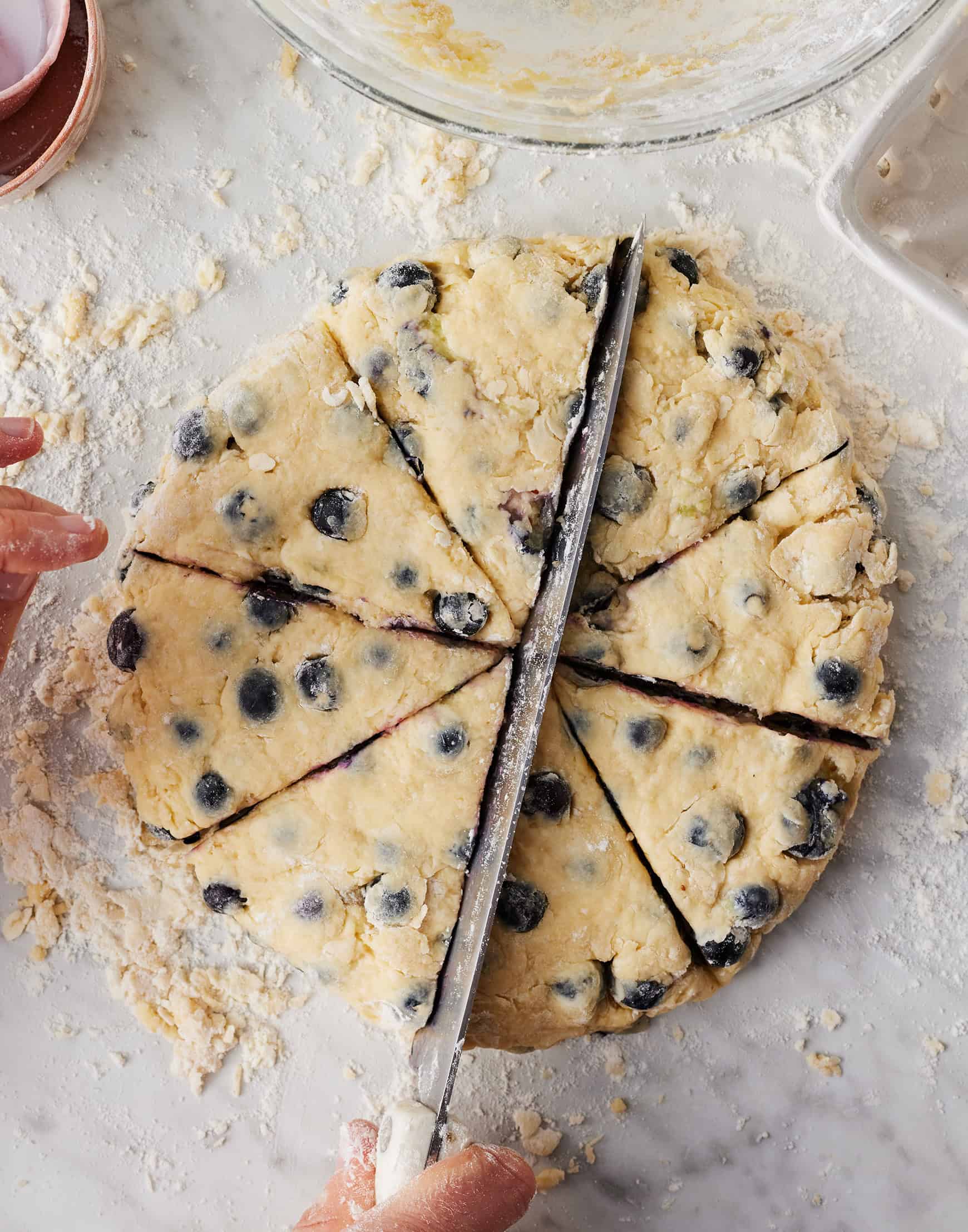 Slicing scone dough into 8 equal wedges