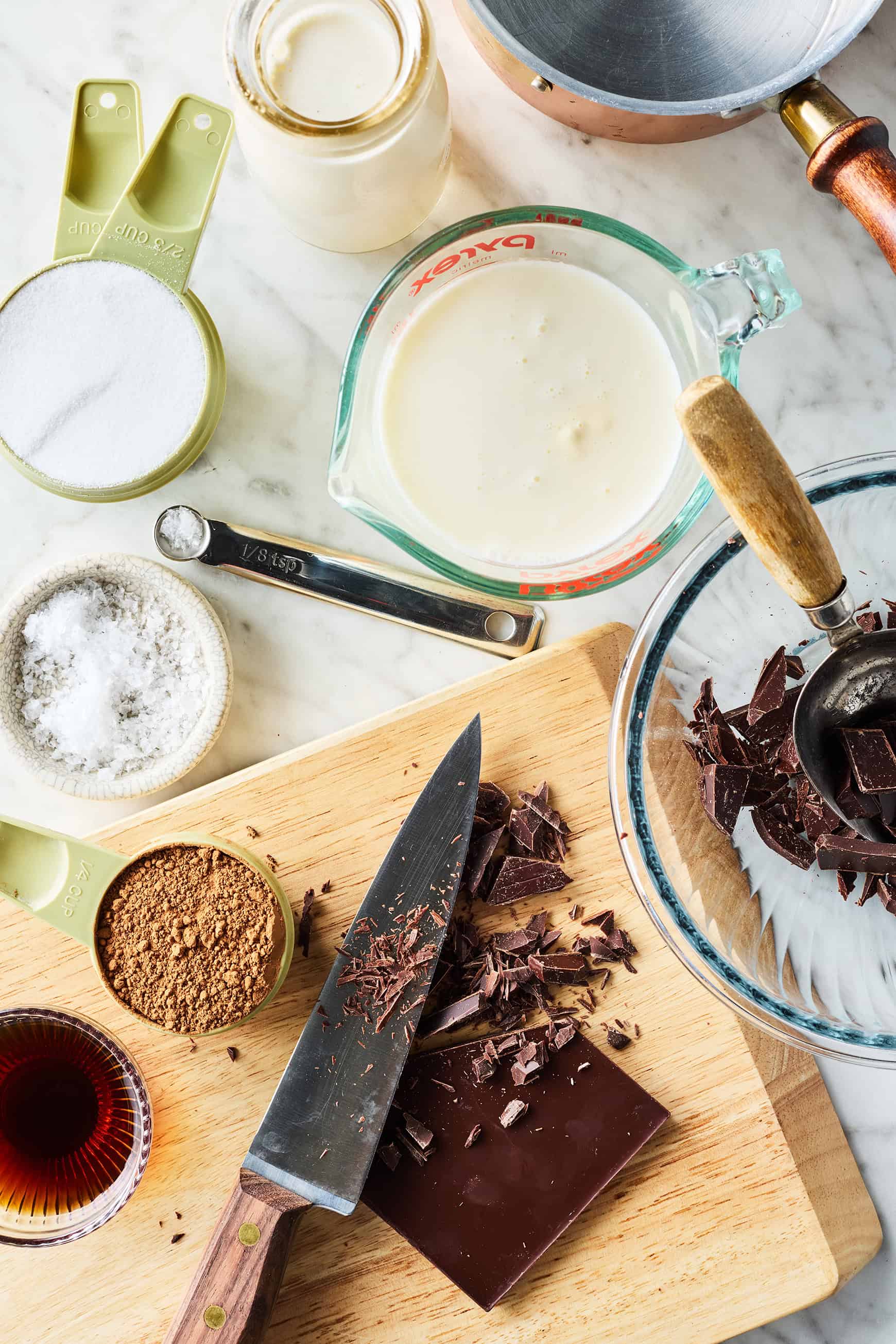 Recipe ingredients - heavy cream, whole milk, sugar, cocoa powder, dark chocolate, vanilla, and salt