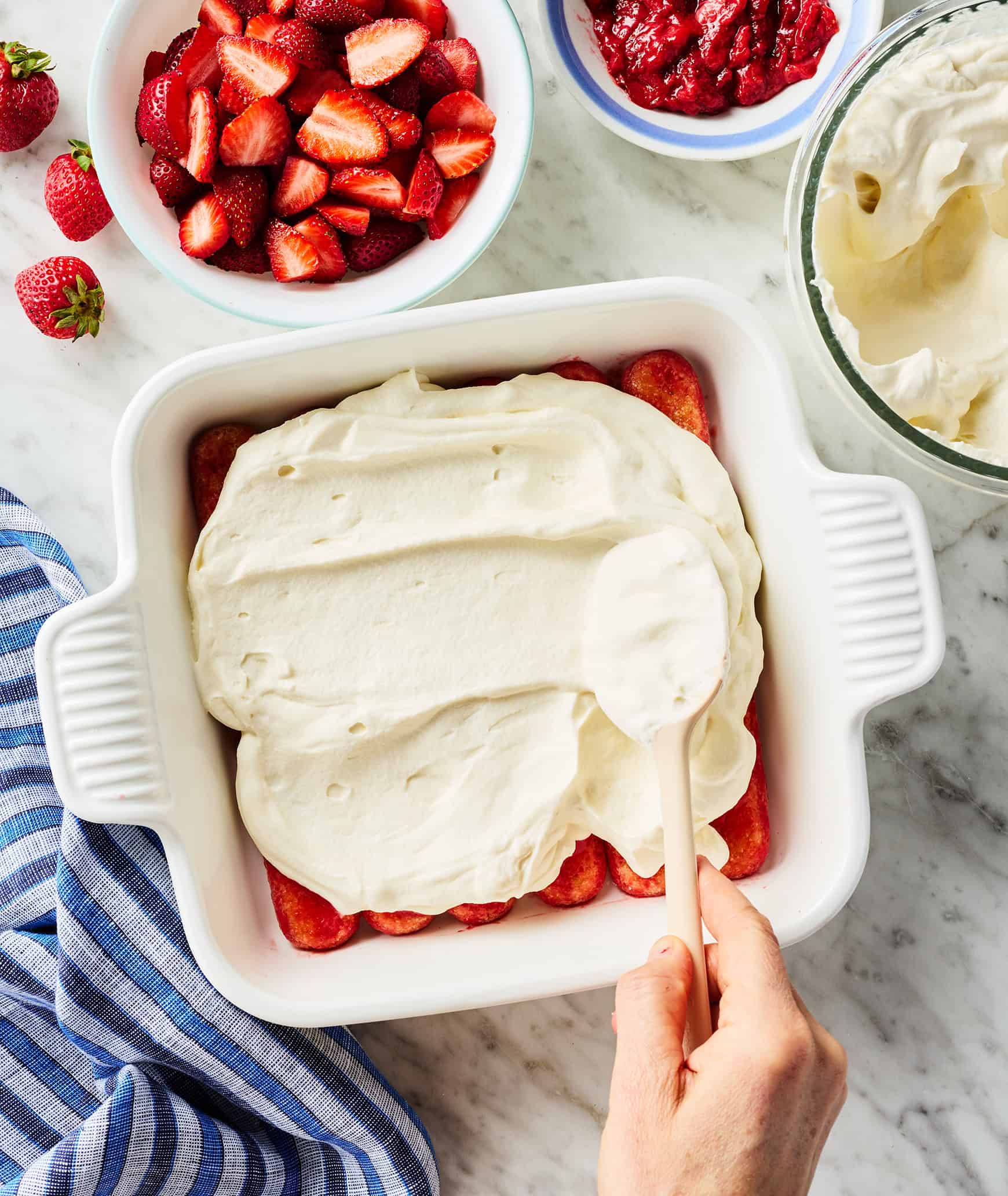 Smoothing cream into an even layer