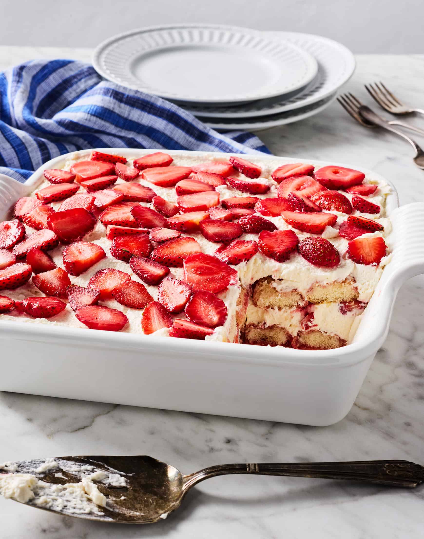 Strawberry tiramisu with slice cut out
