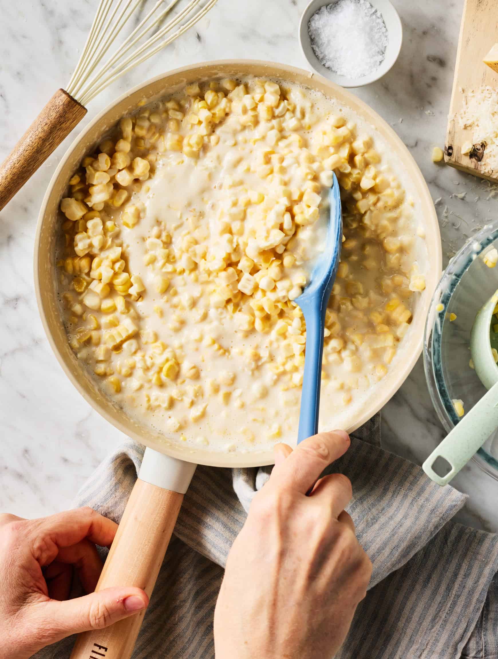 Stirring corn mixture in skillet