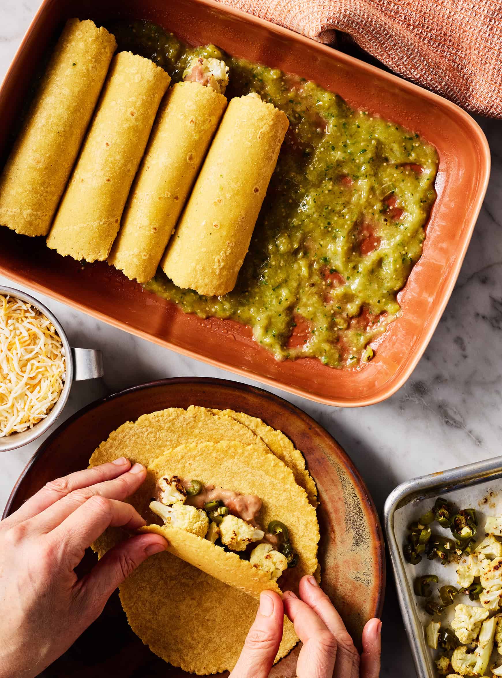 Rolling enchiladas verdes