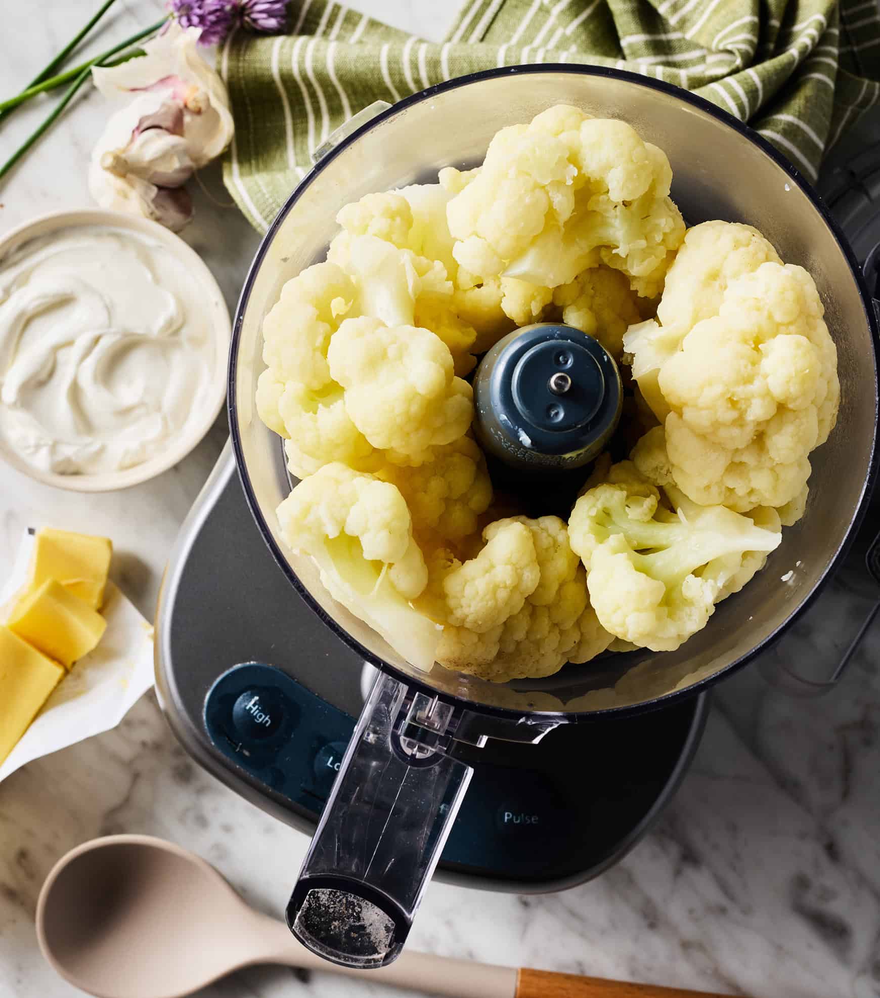 Boiled cauliflower florets in food processor