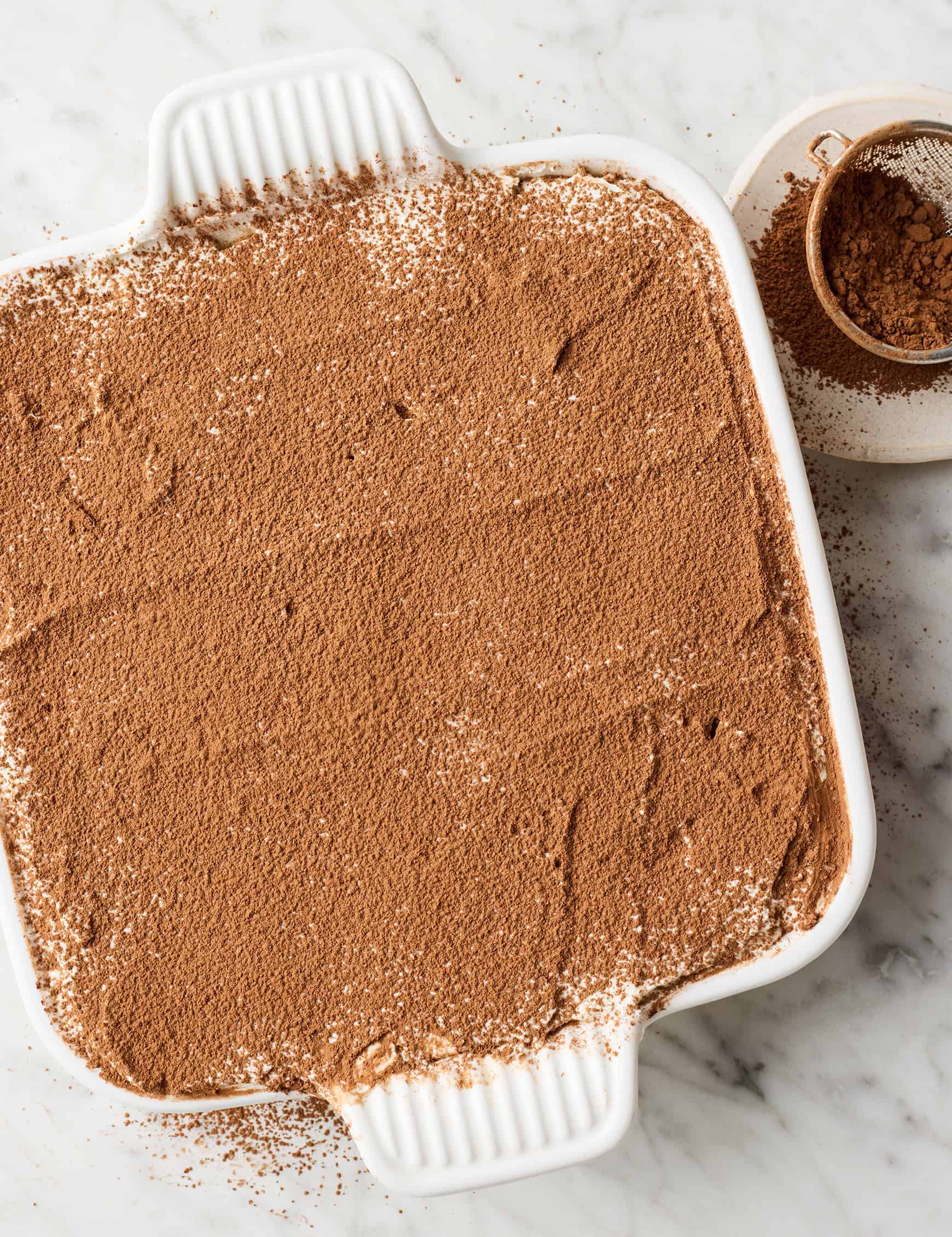 Tiramisu topped with cocoa powder