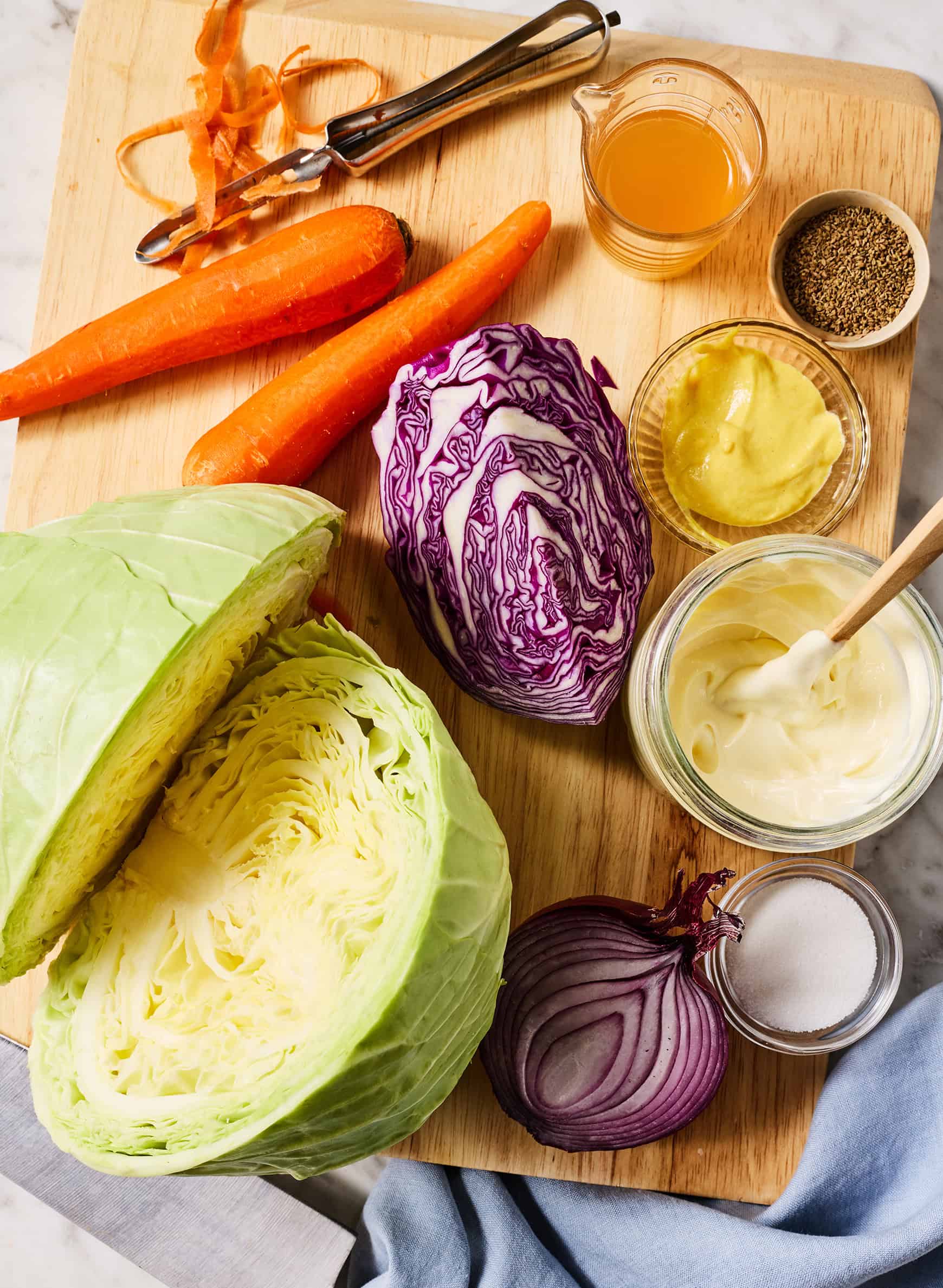 Easy coleslaw recipe ingredients on cutting board
