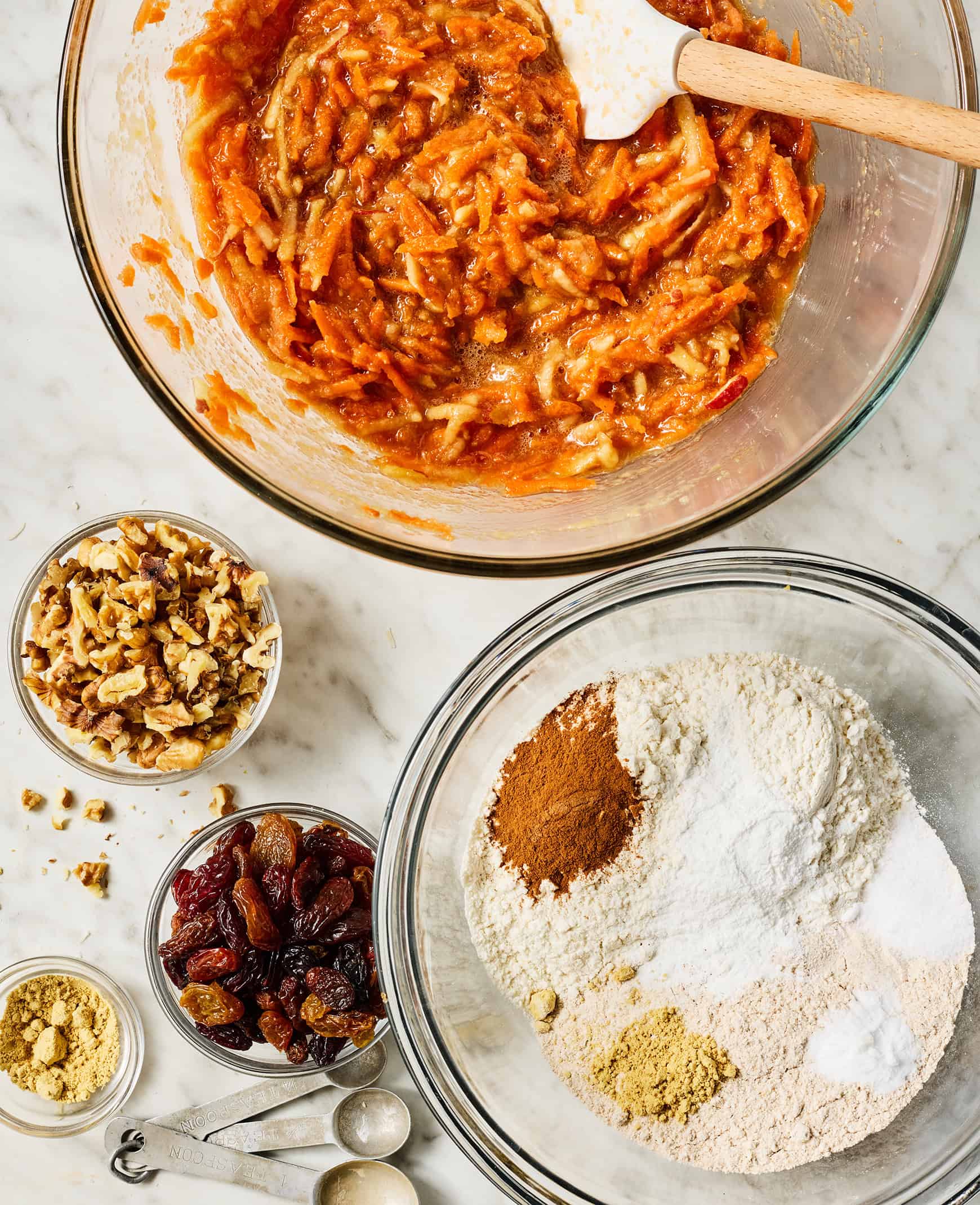 Bowl of wet ingredients next to bowl of dry ingredients