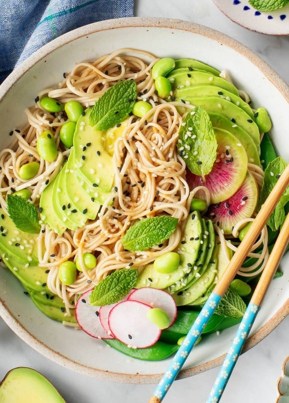Soba noodles with radishes, snap peas, avocado, and mint