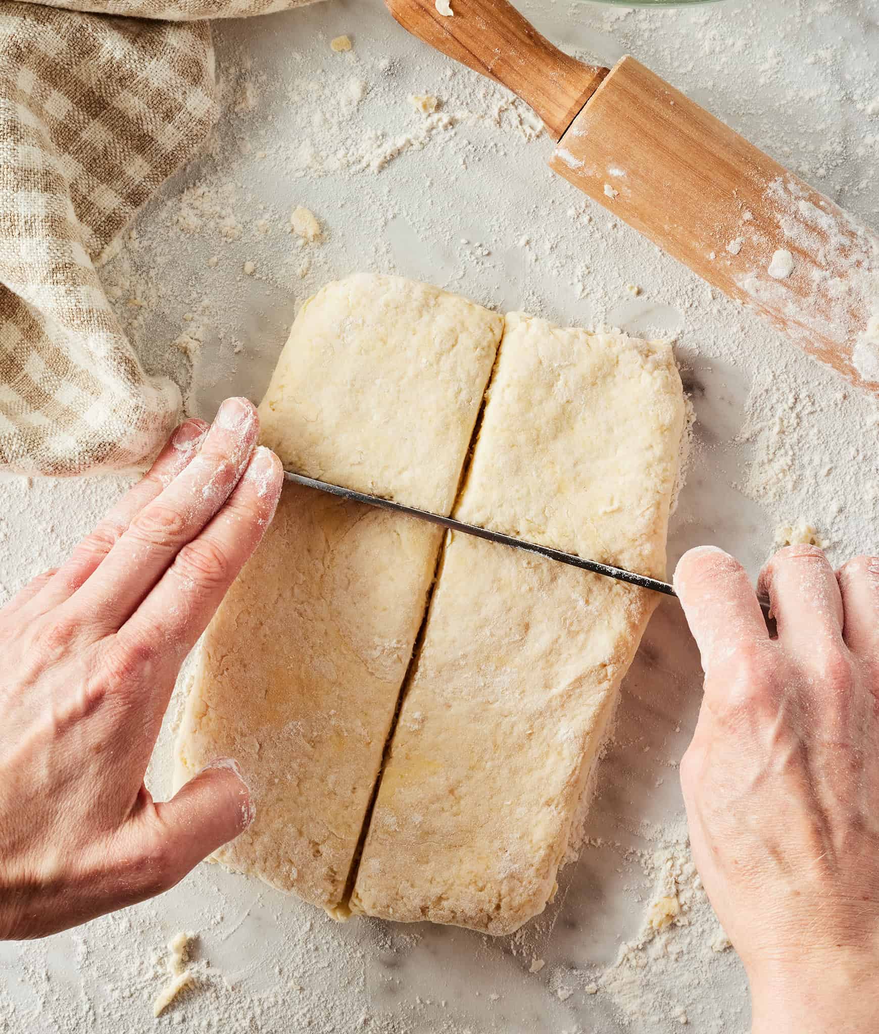 Slicing strawberry shortcake dough into 6 biscuits