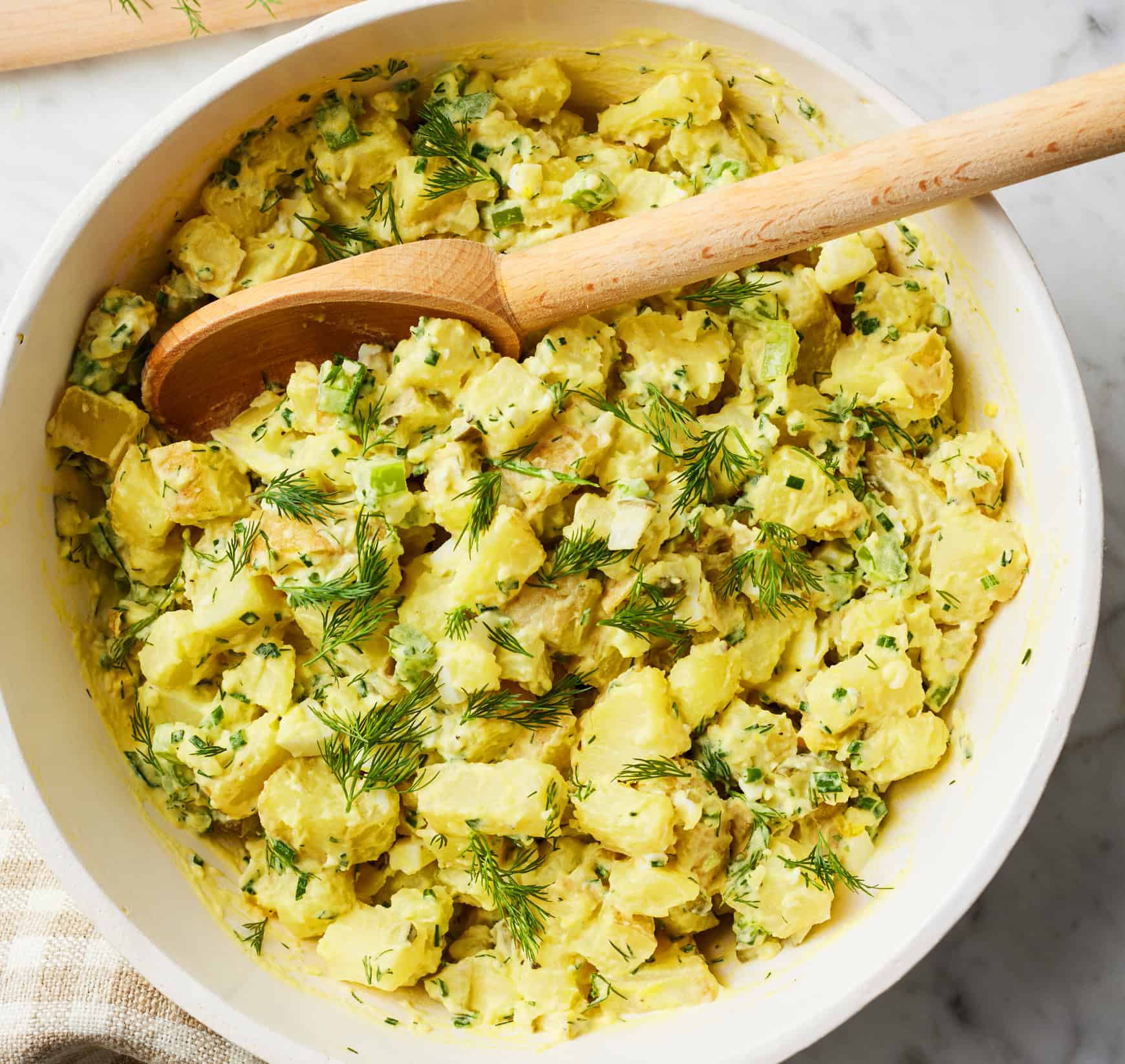 Creamy potato salad with dill pickles