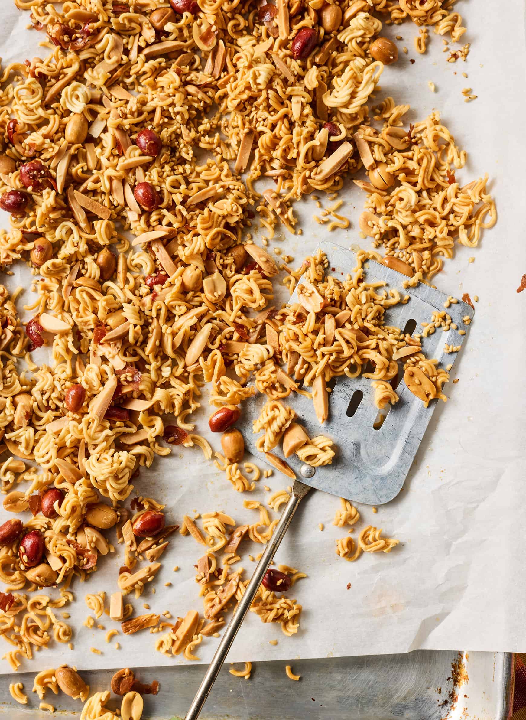 Toasted ramen noodle and nut mixture on baking sheet